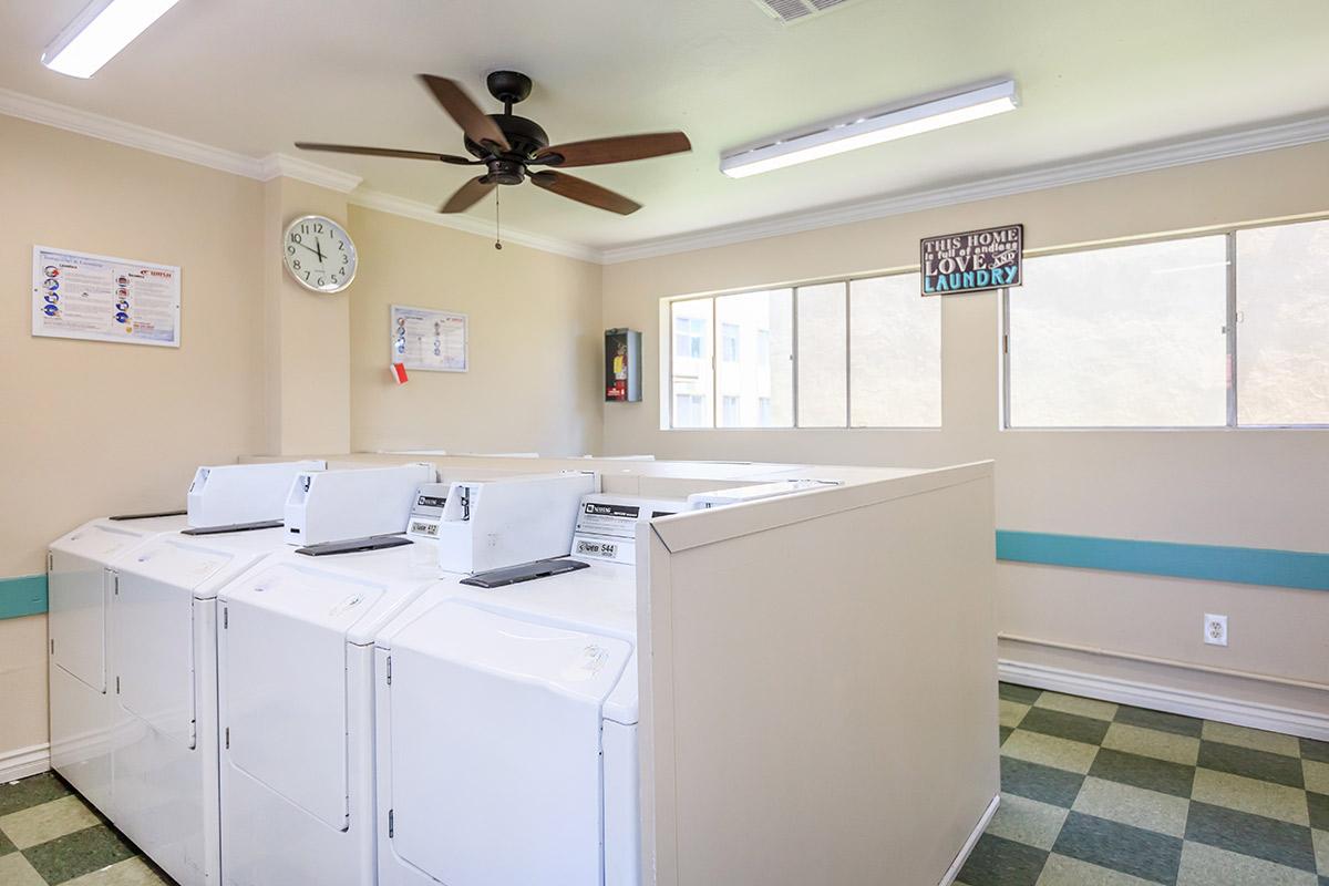 a white refrigerator freezer sitting inside of a kitchen