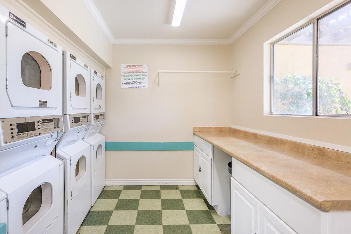 a kitchen with a sink and a window