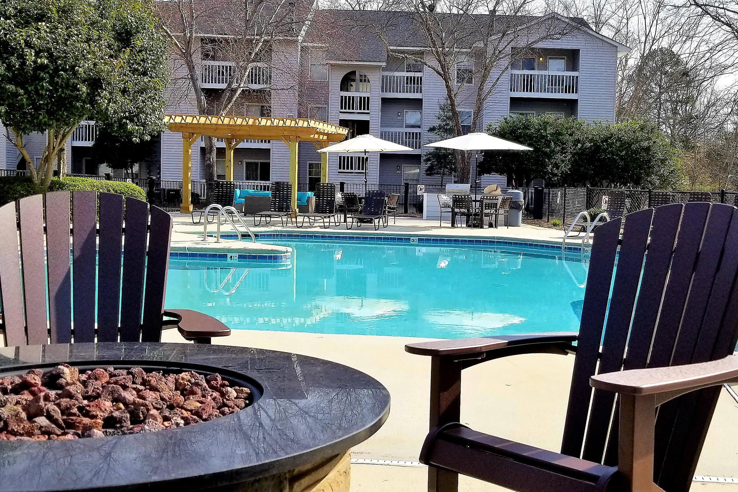 Fire pit in the pool area at Greyeagle in Taylors, SC.