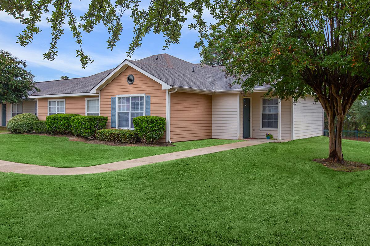 a large lawn in front of a house