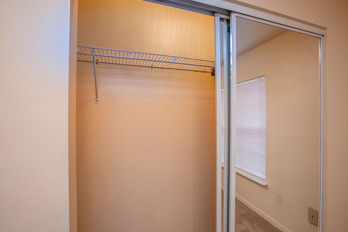 a white tub sitting next to a shower