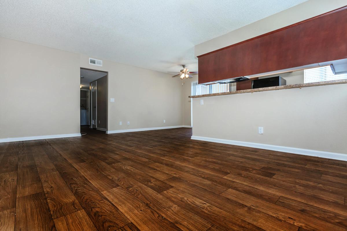 a kitchen with a wood floor