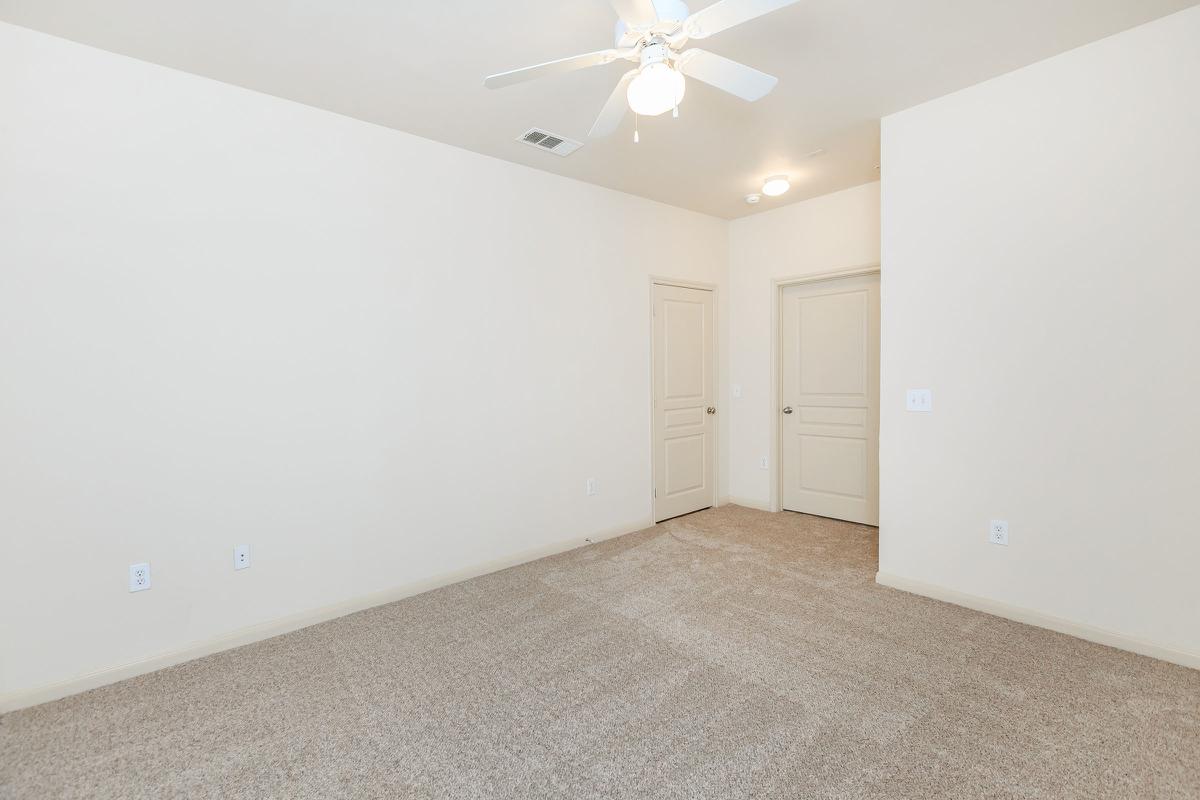 PLUSH CARPETING AND CEILING FANS IN YOUR THREE BEDROOM APARTMENT HOME