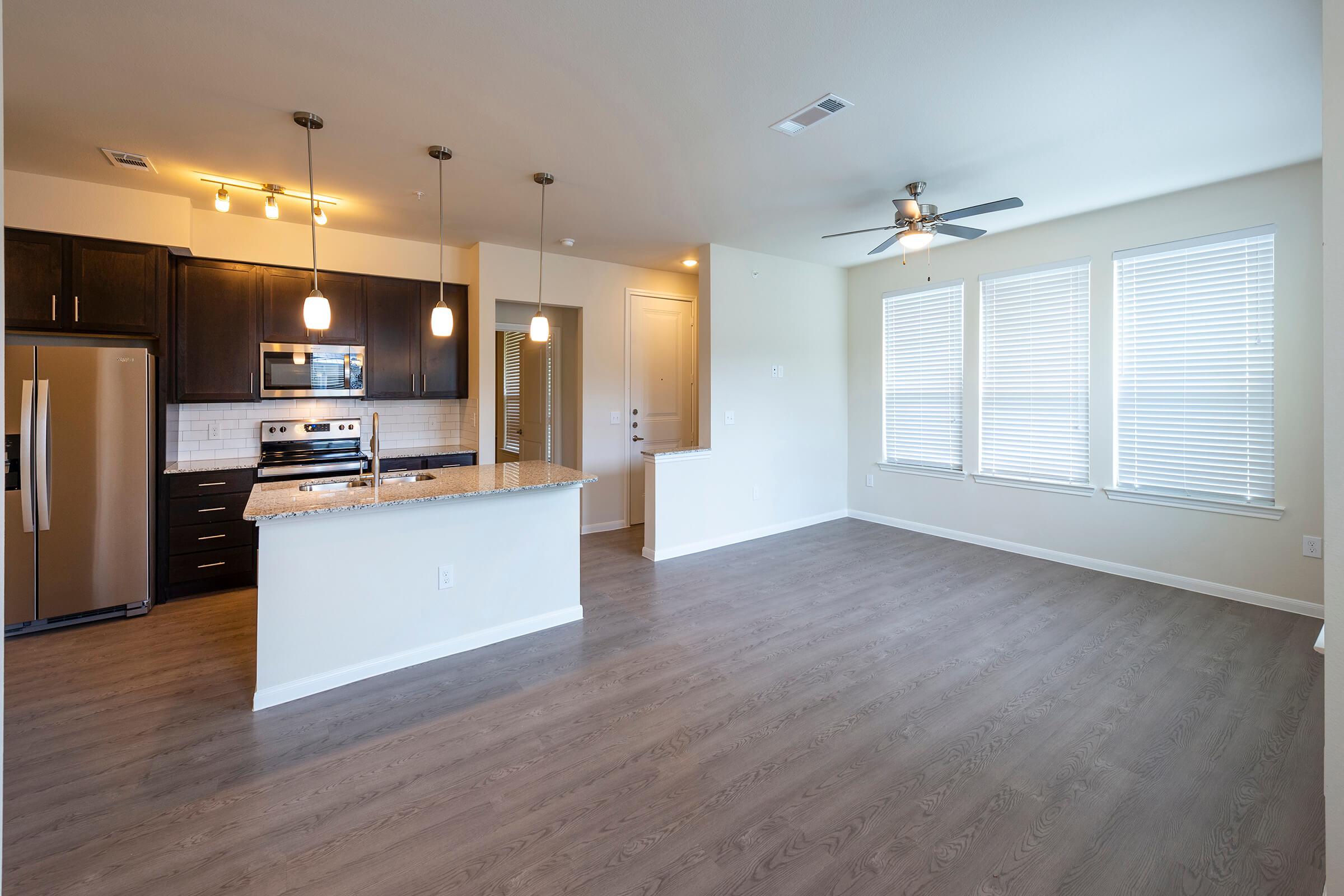 BRIGHT AND INVITING LIVING SPACE AT THE RESERVE AT CITY PLACE IN CONROE, TEXAS