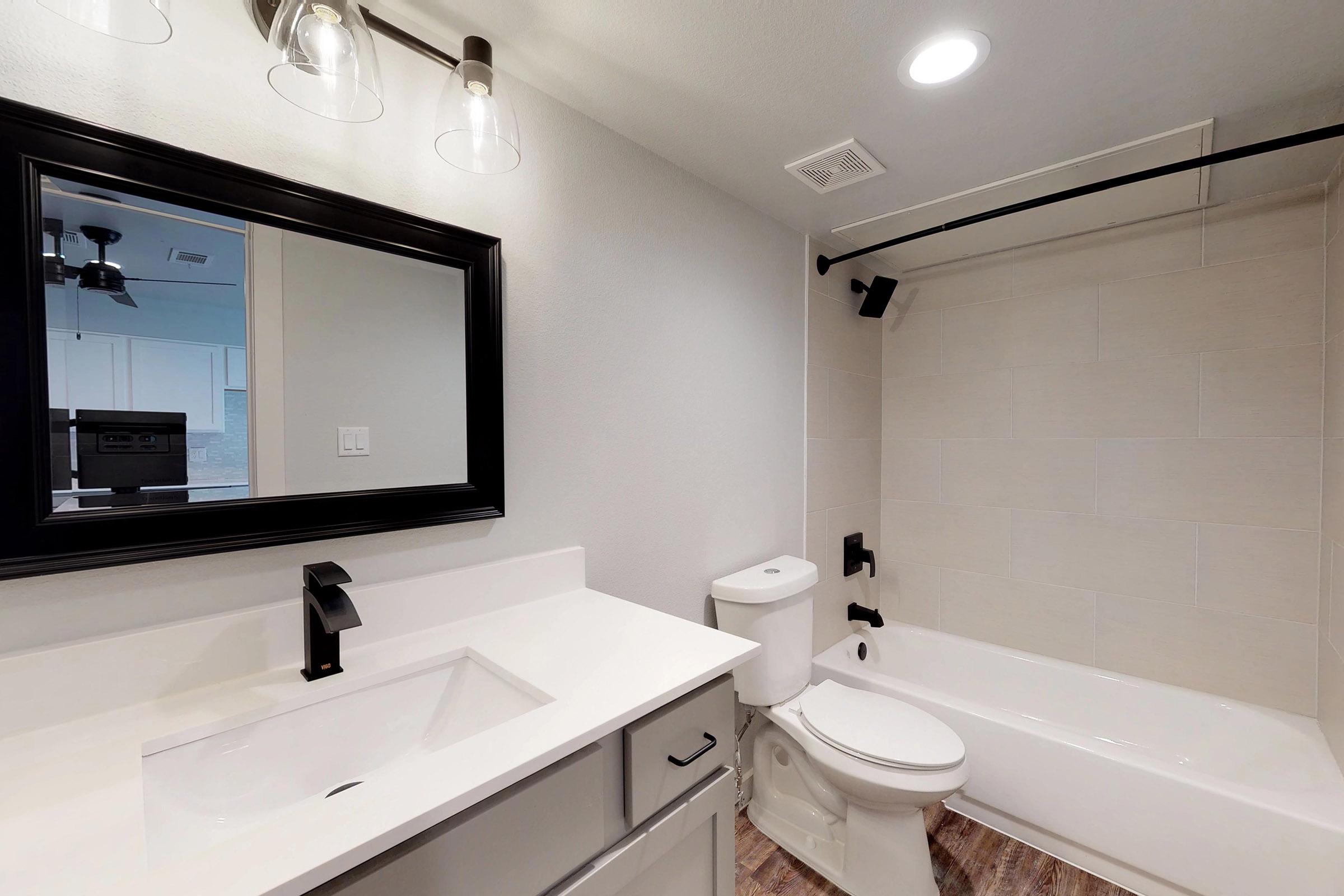 bathroom with a white countertop