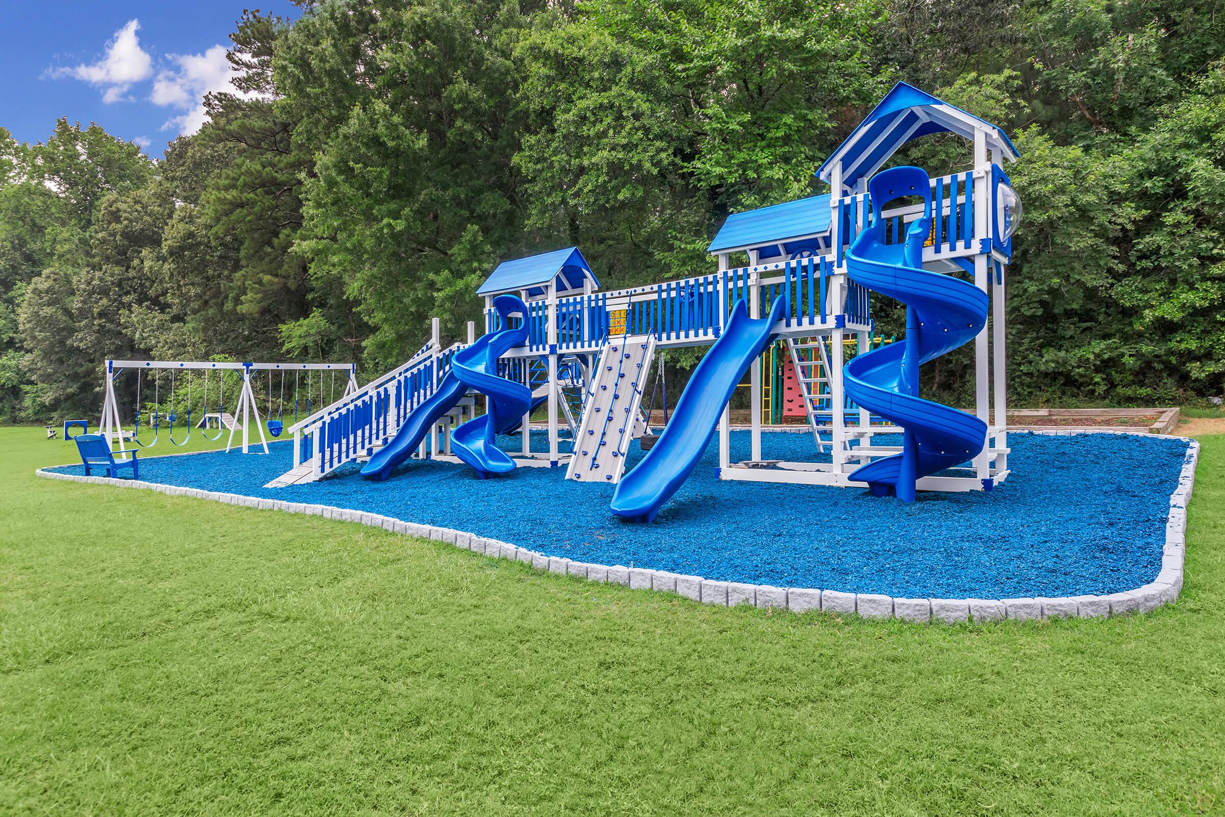 a playground with a blue toy