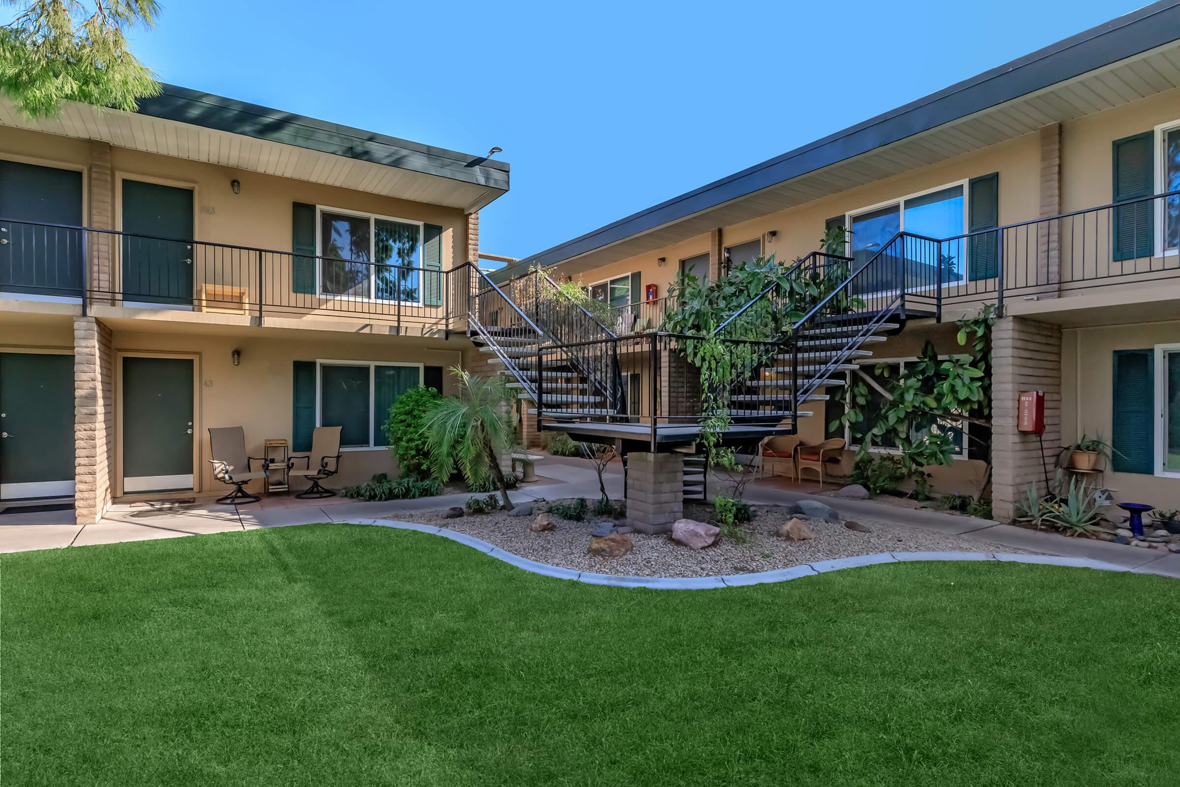 a large lawn in front of a house