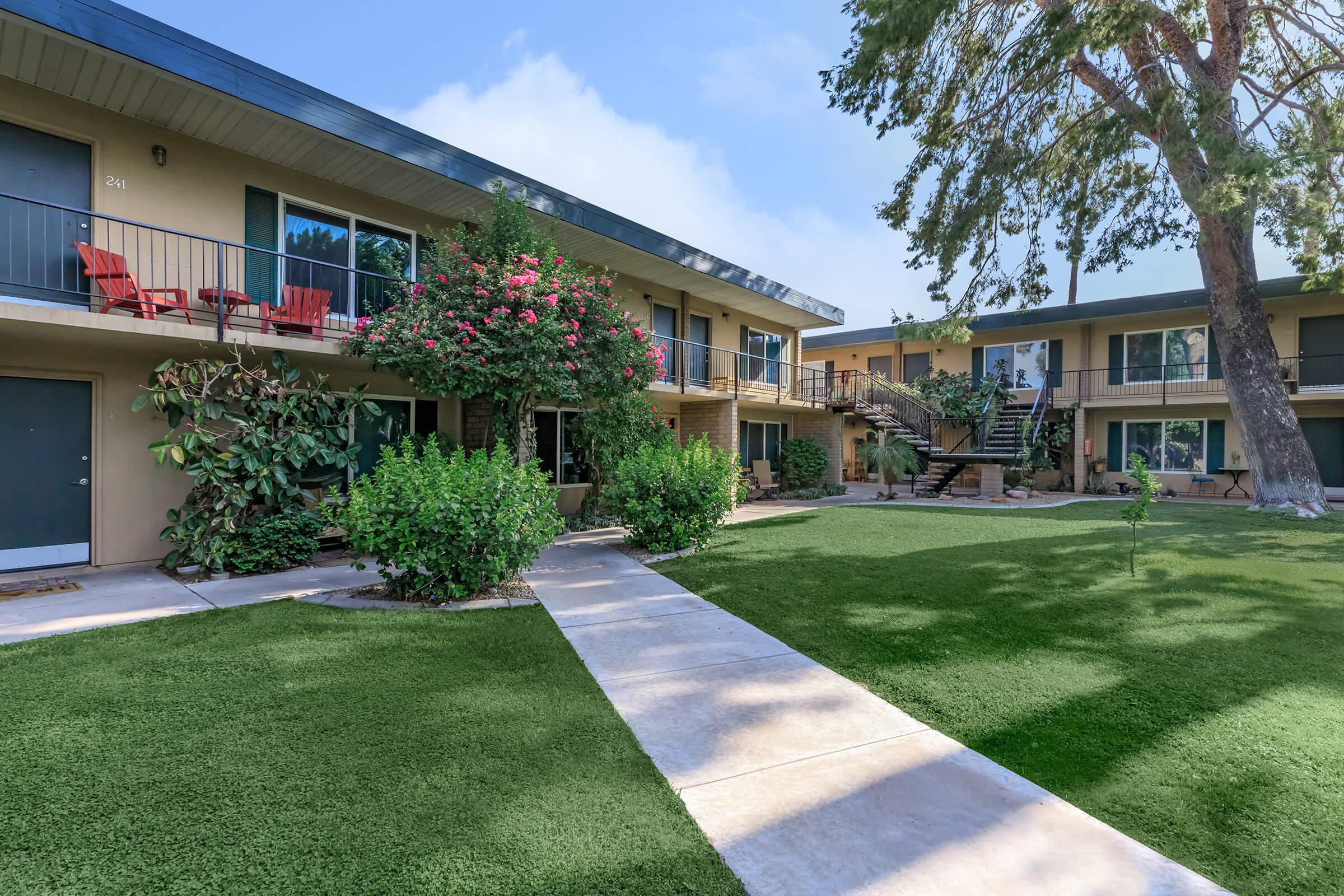 a large lawn in front of a house