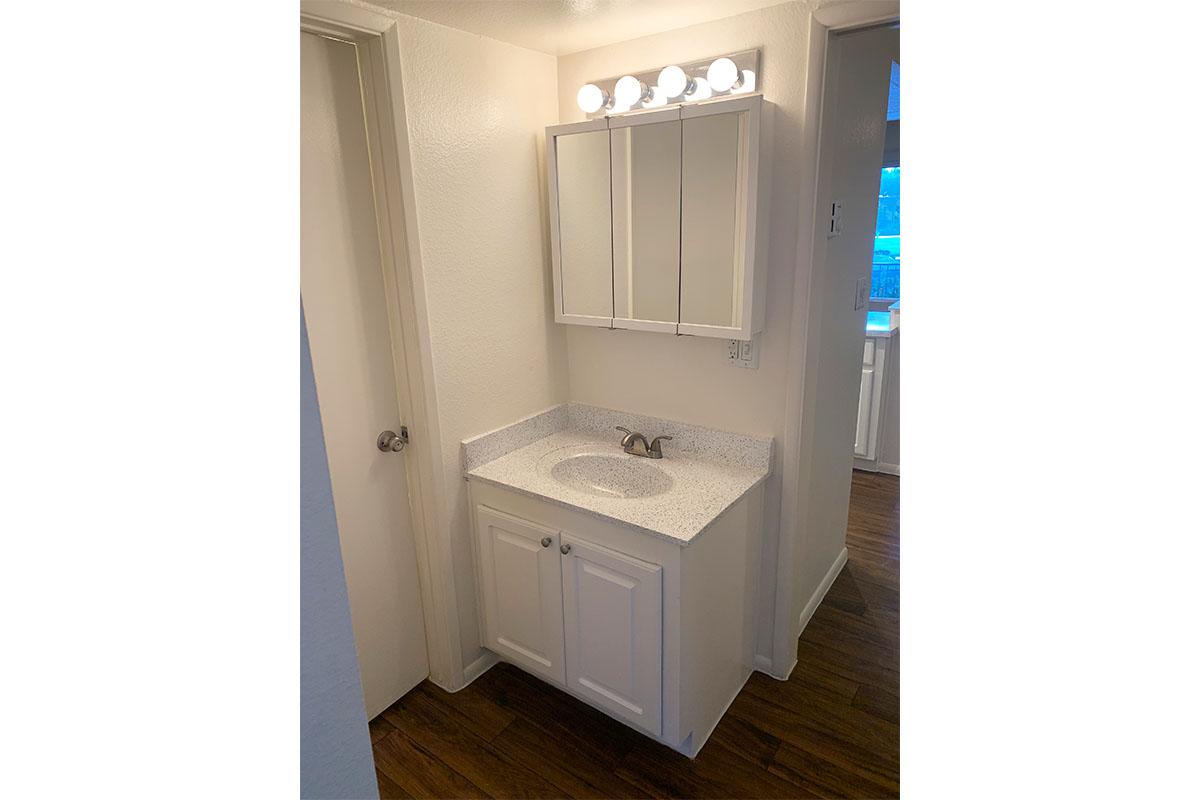 a white refrigerator freezer sitting in a room