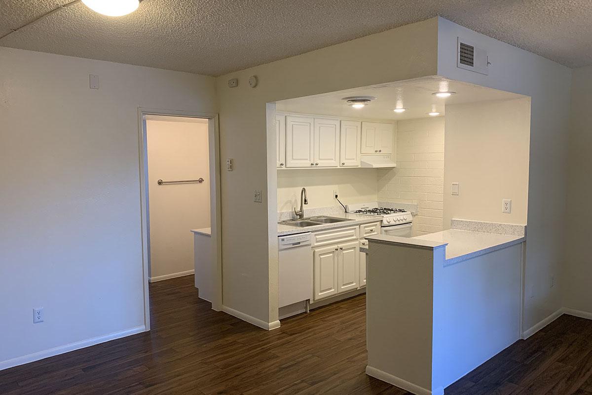 a large white refrigerator in a kitchen