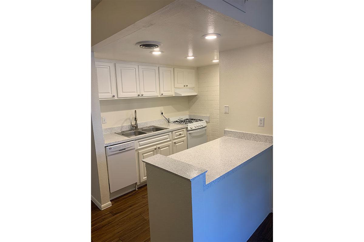 a large white refrigerator in a kitchen