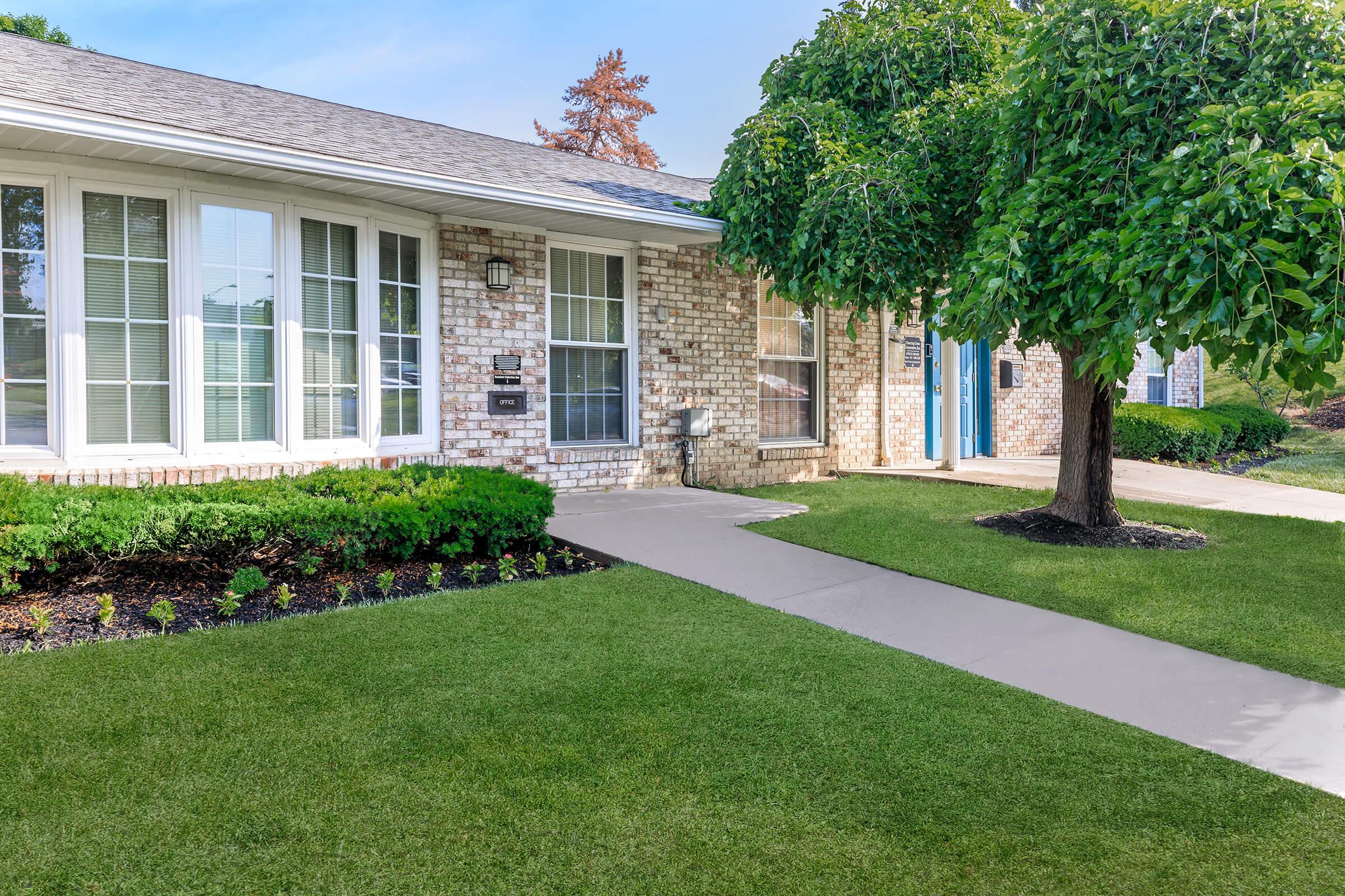 a large lawn in front of a house