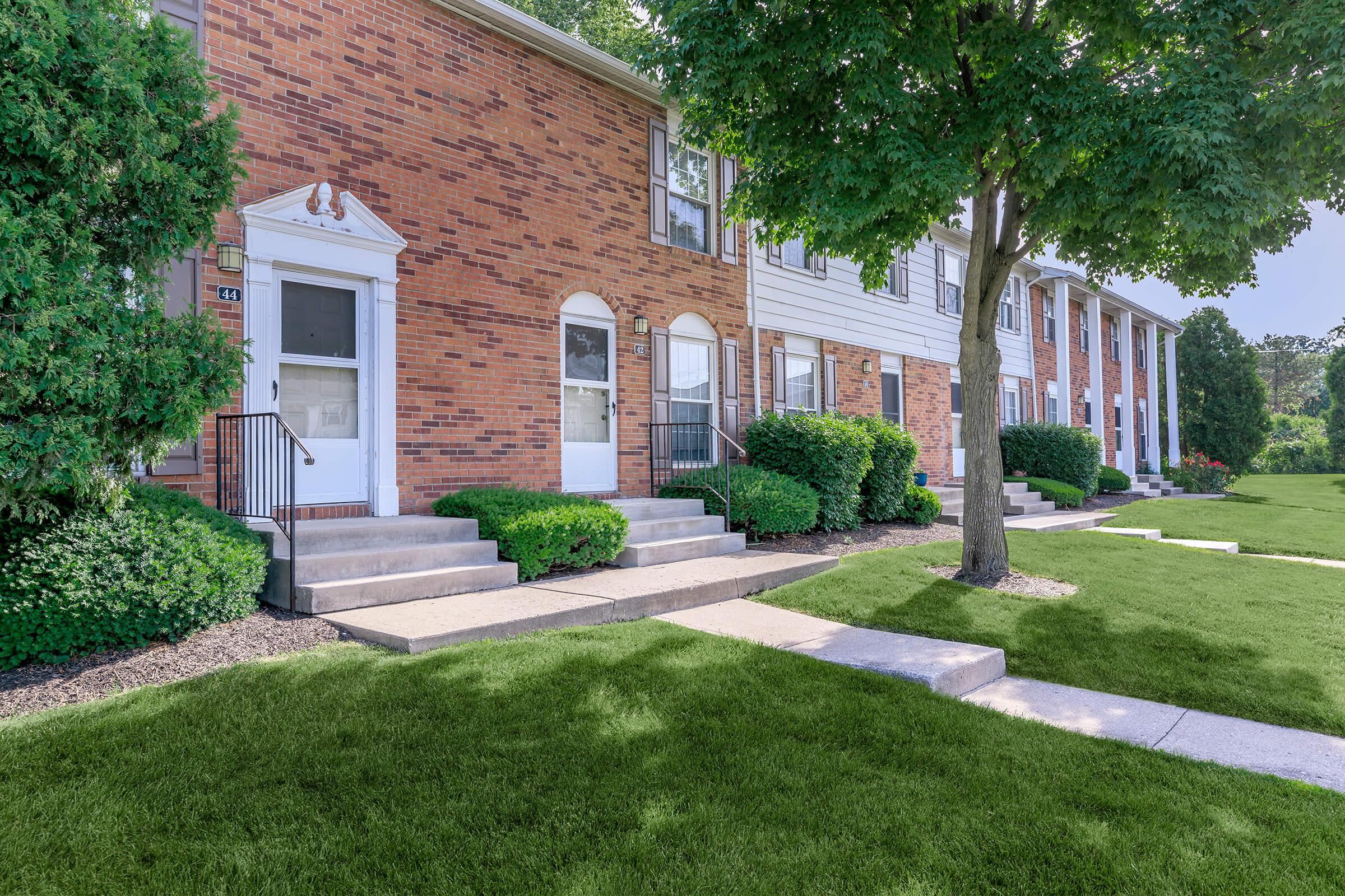 a large lawn in front of a house