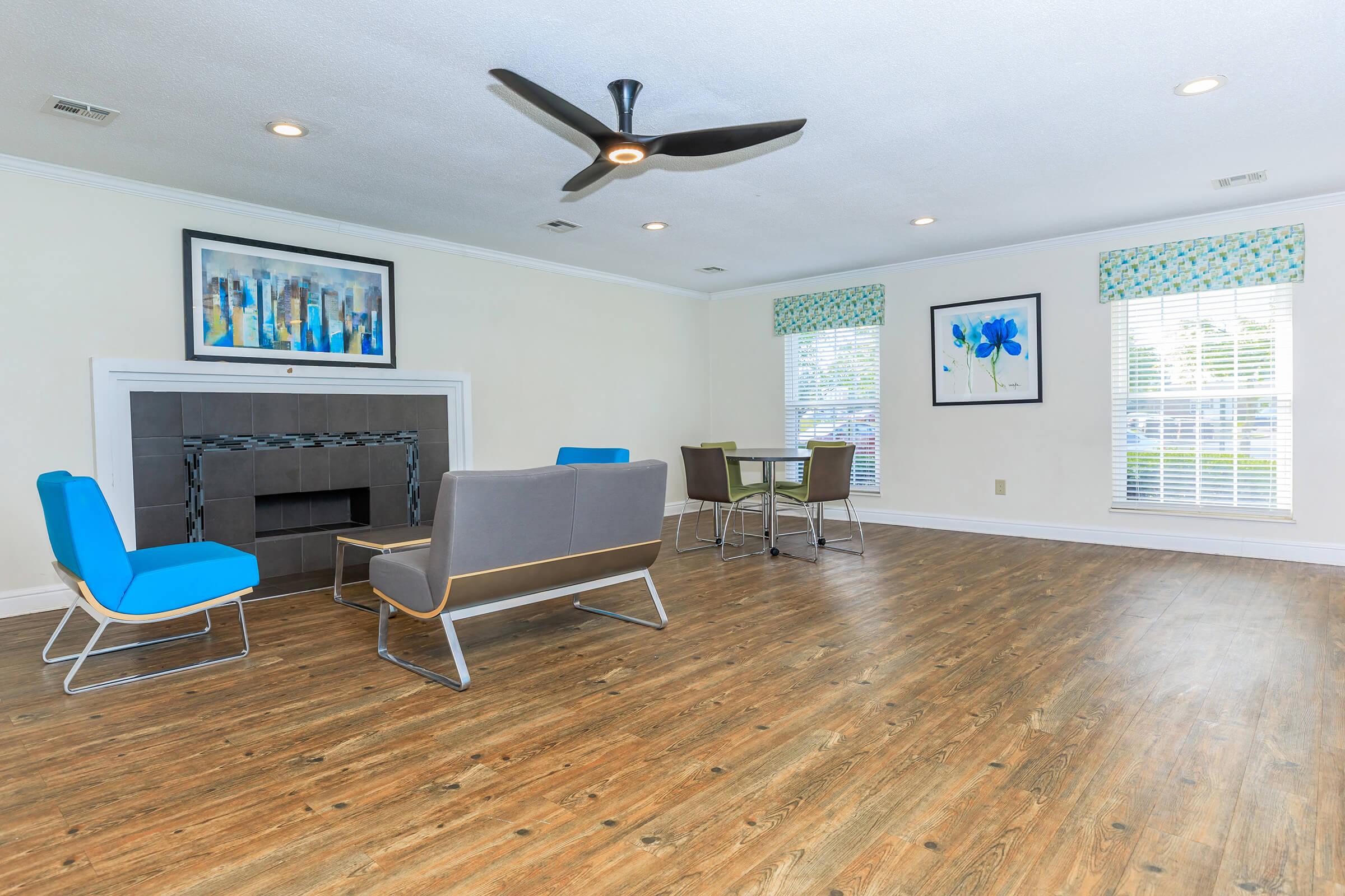 a room filled with furniture and a flat screen tv