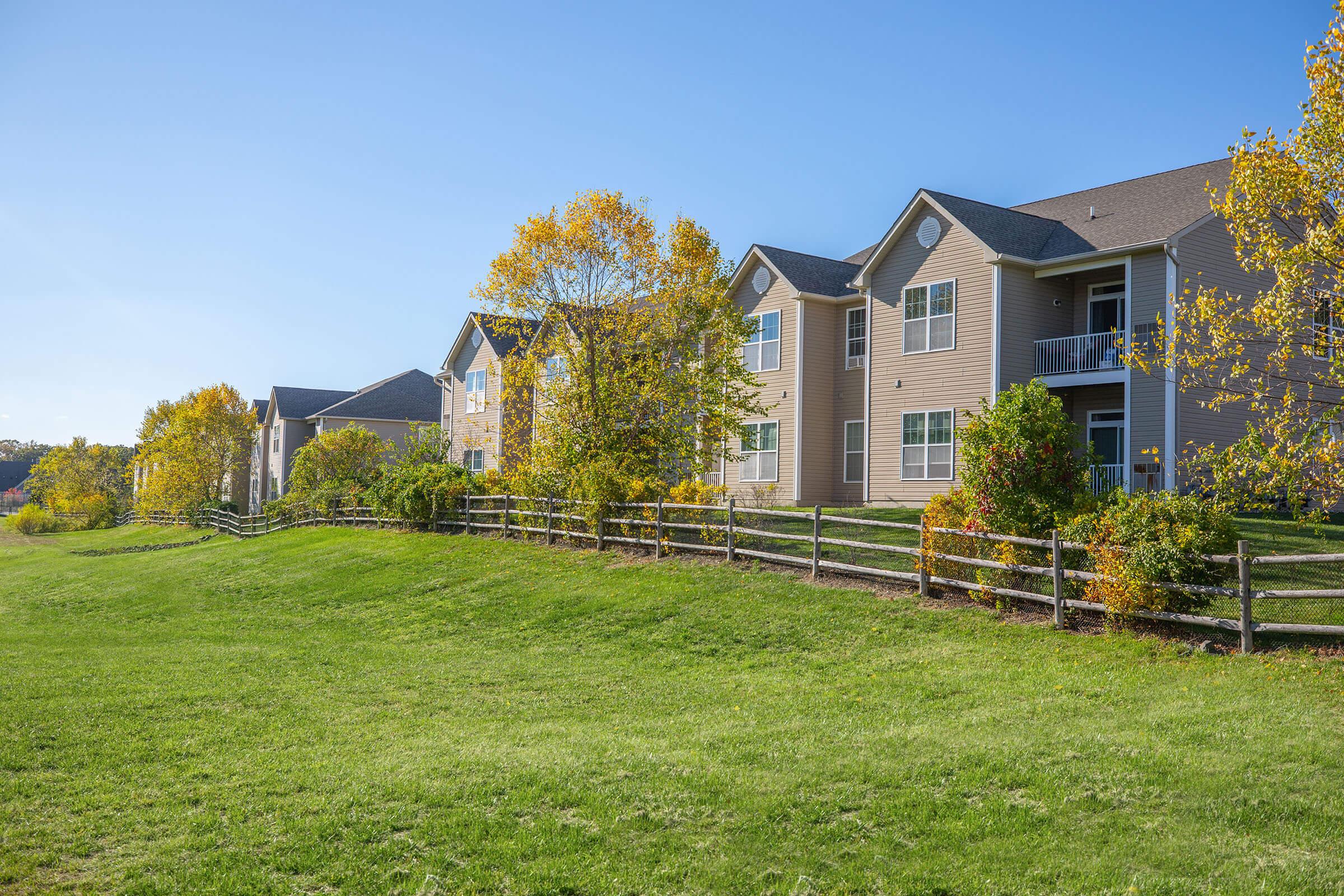 a large lawn in front of a house