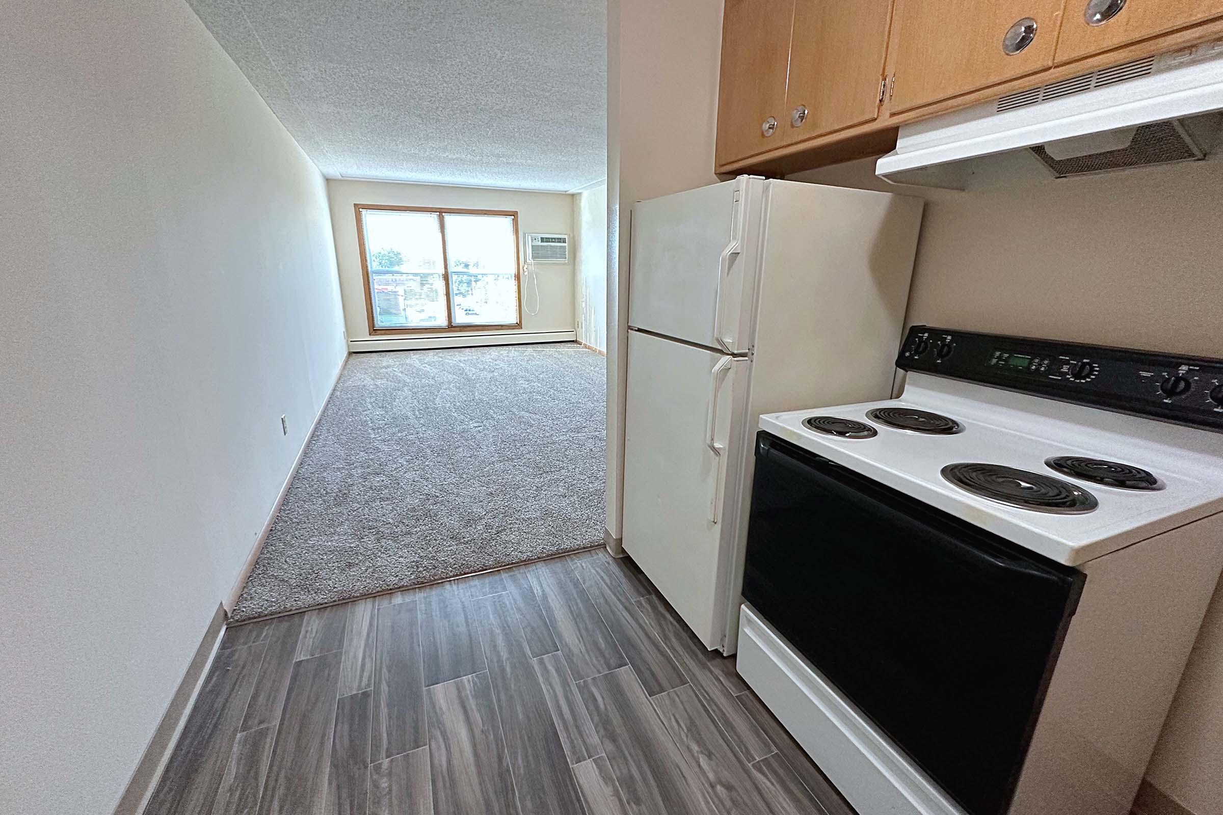 a stove top oven sitting inside of a building