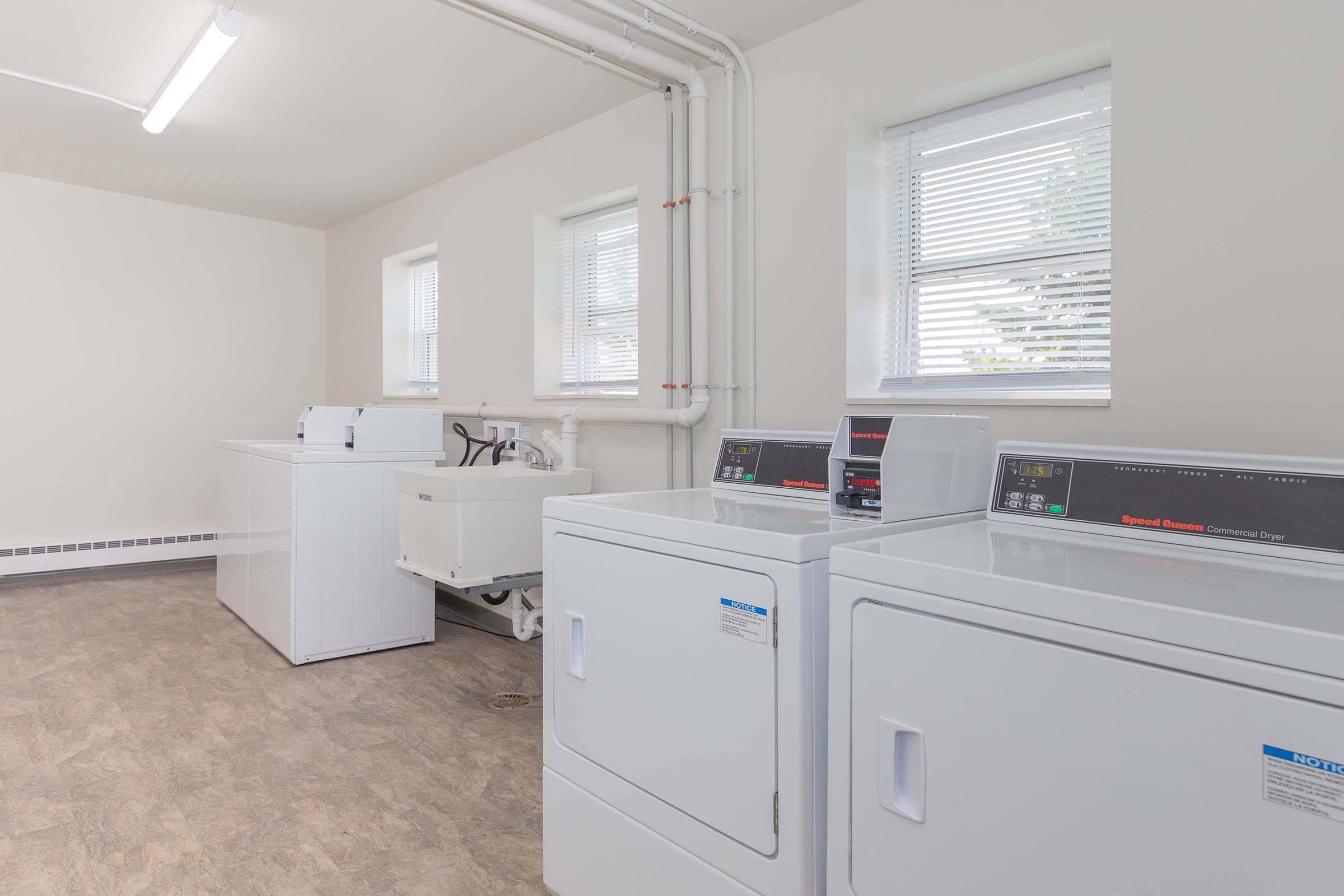 a kitchen with a sink and a window