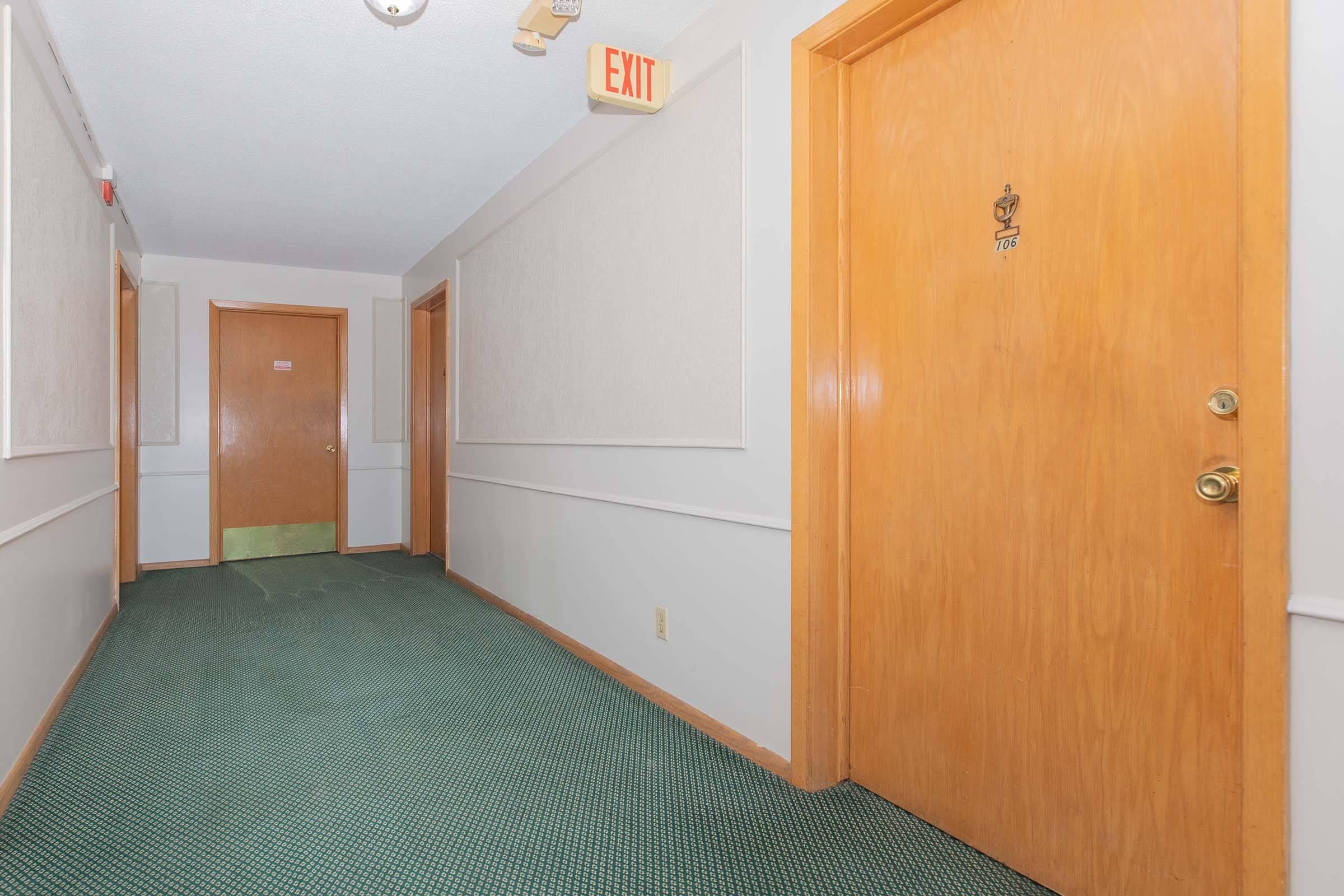 a bedroom with a green door