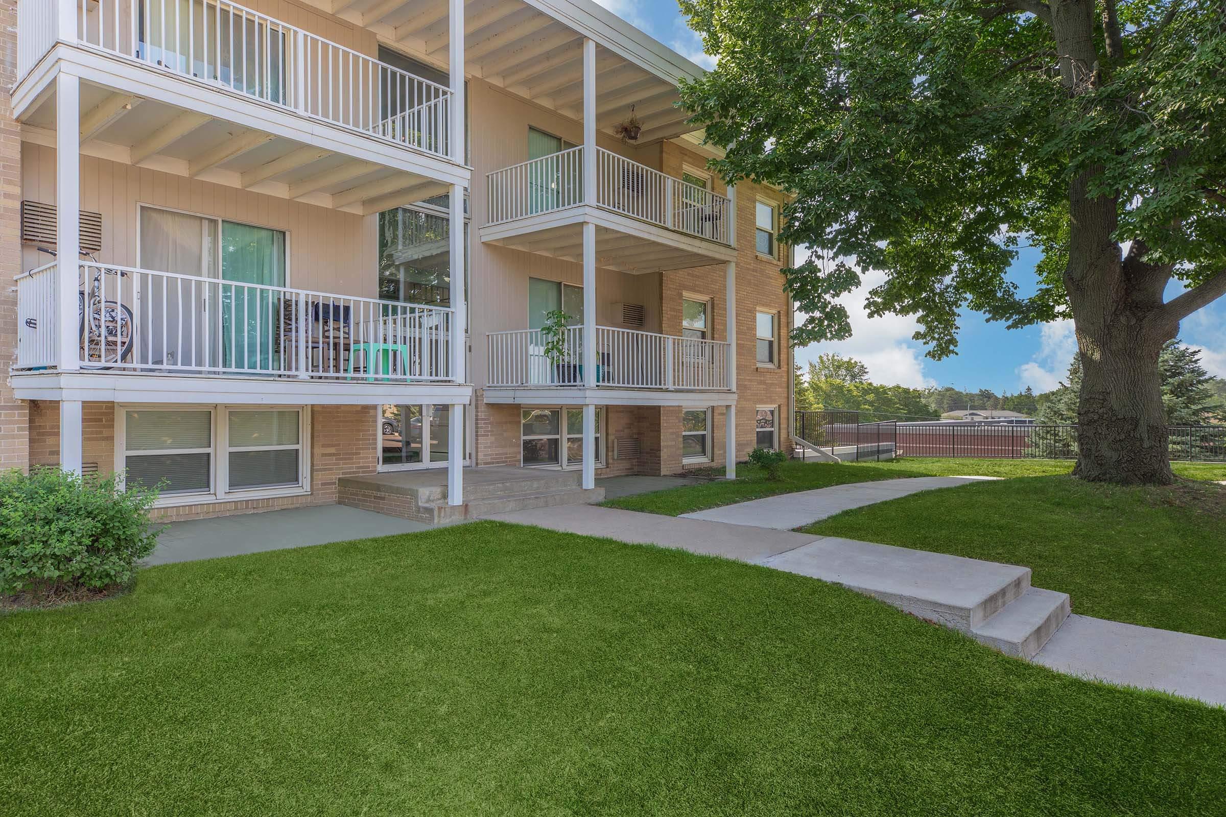 a large lawn in front of a house