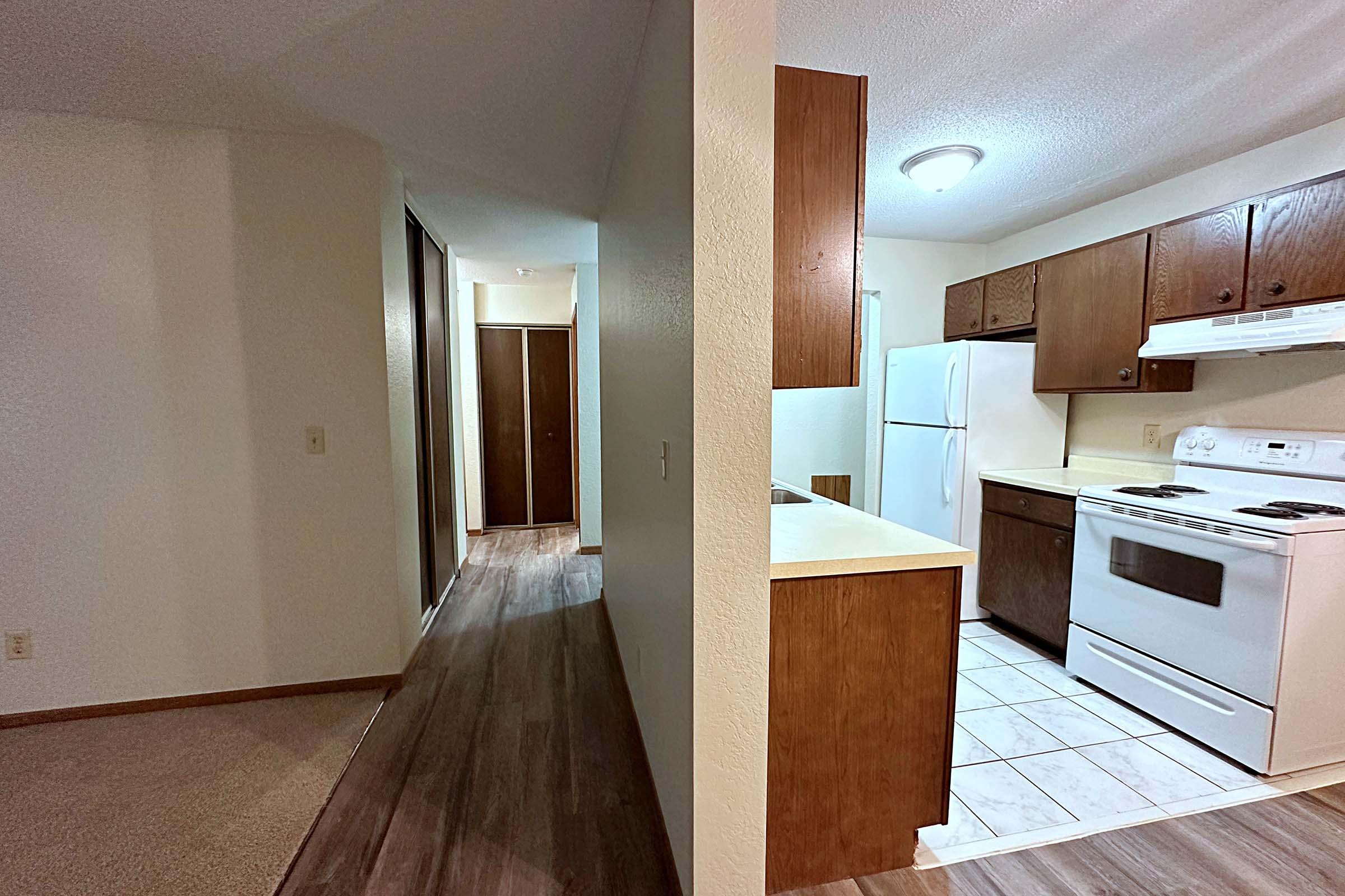 a kitchen with a wood floor