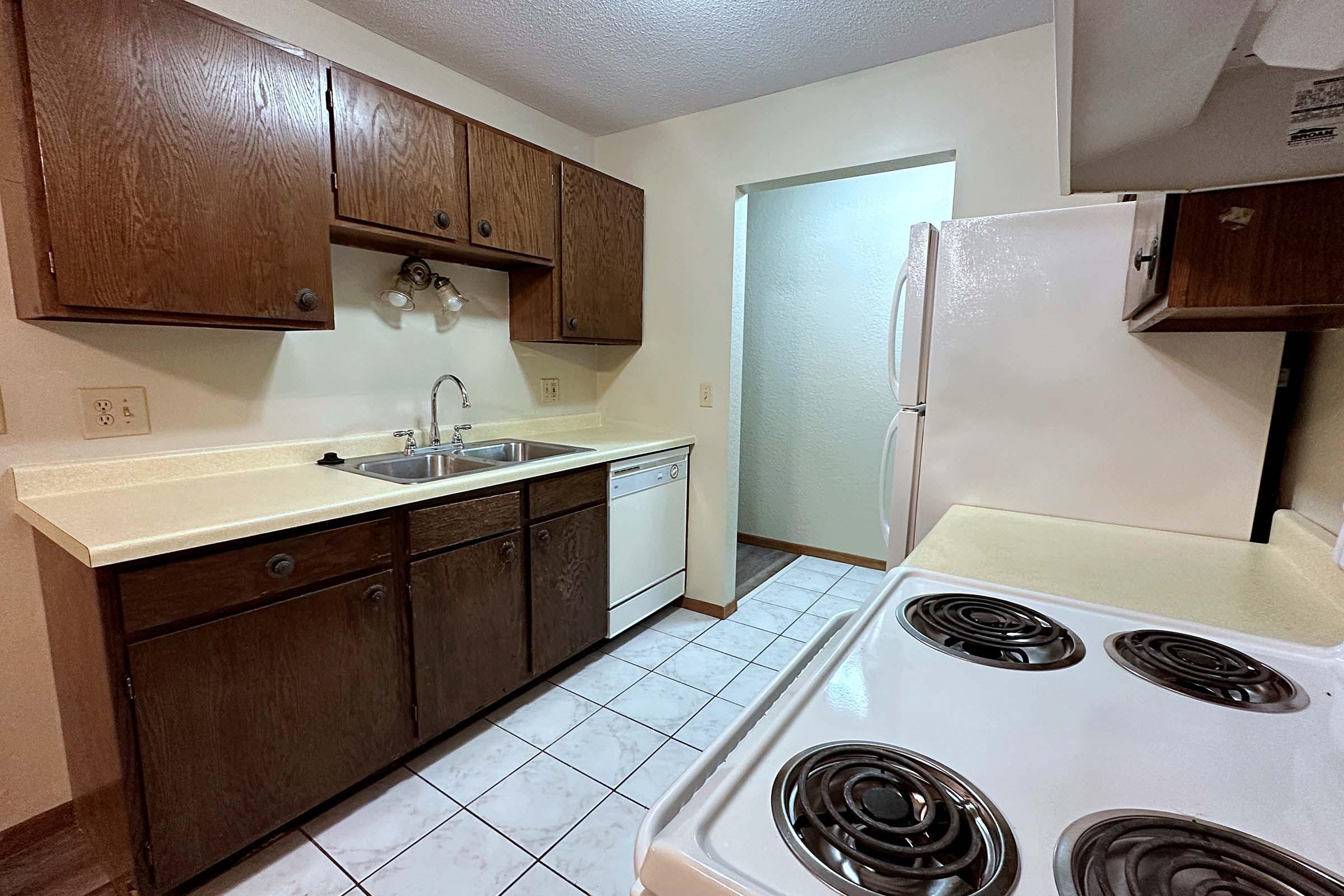 a kitchen with a sink and a microwave