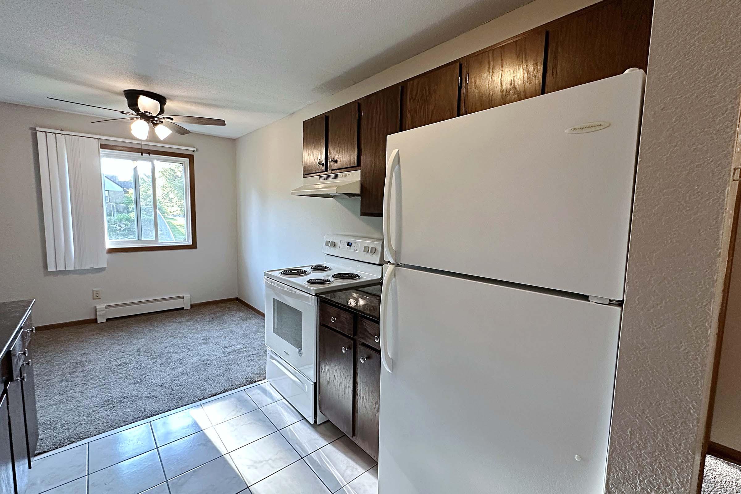 a stainless steel refrigerator in a kitchen