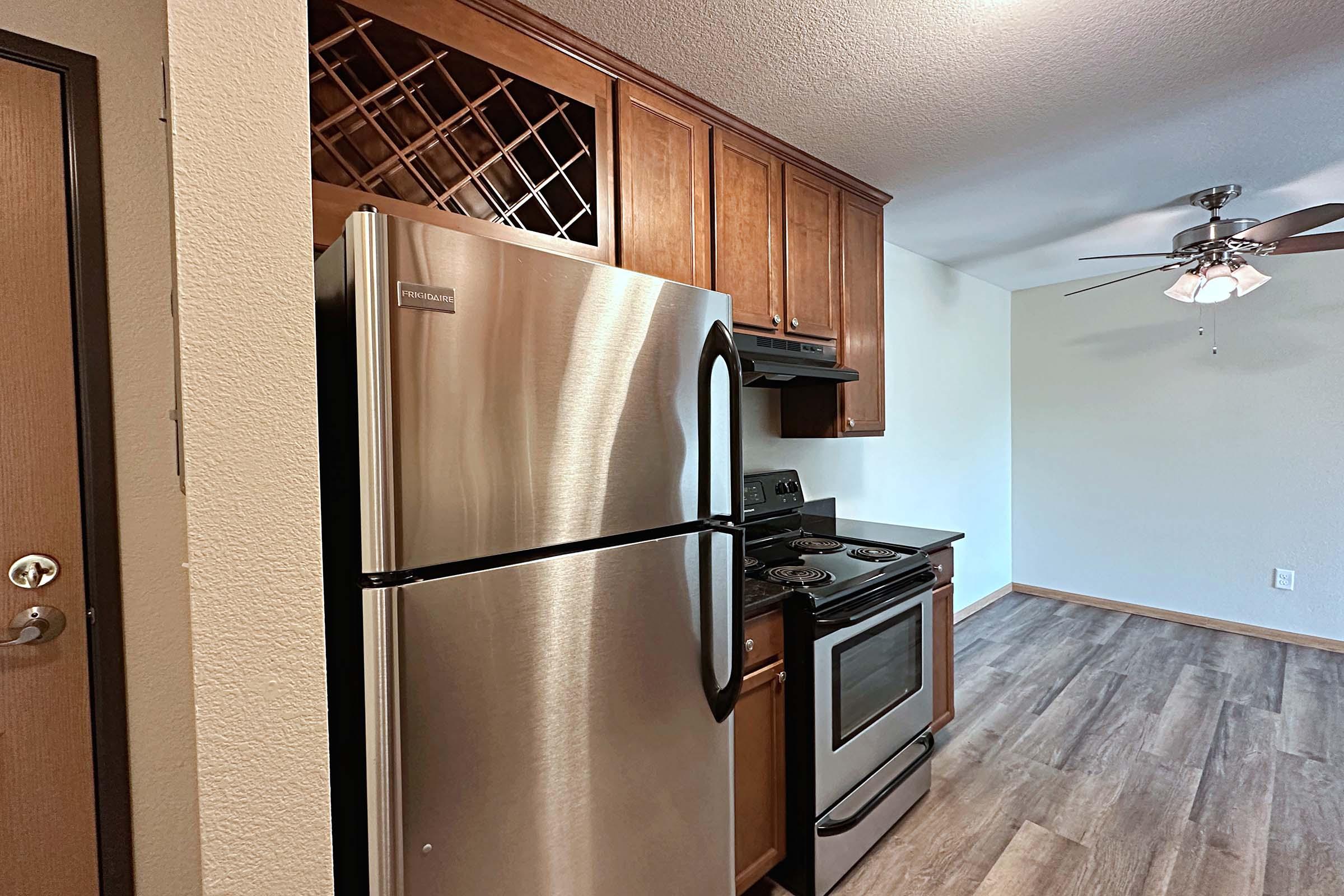 a stainless steel refrigerator in a kitchen