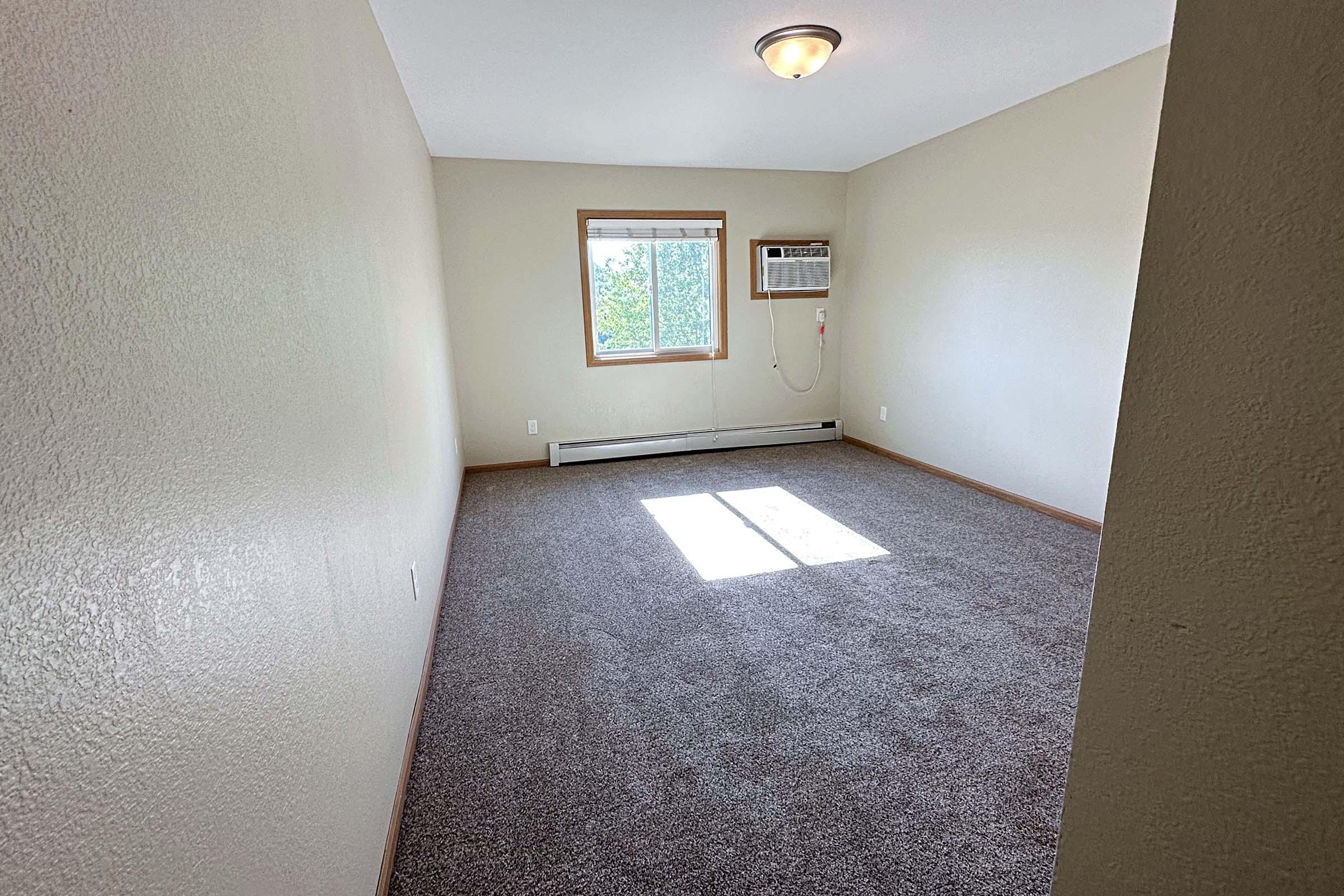 a bedroom with a tiled floor