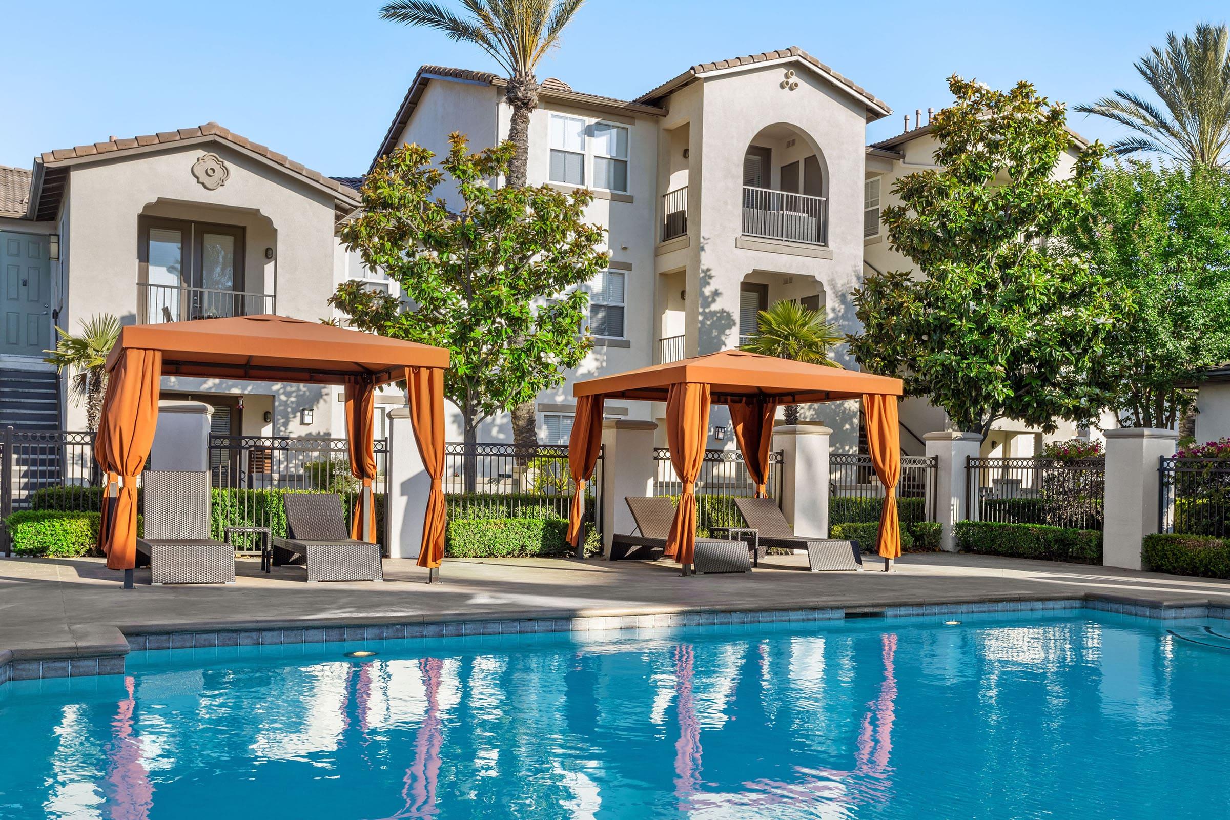 a large pool of water in front of a building