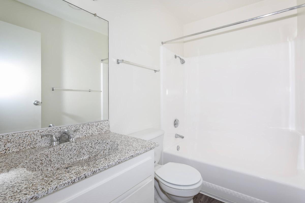 Bathroom with white cabinets