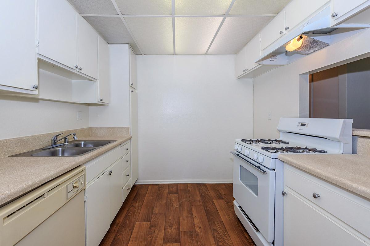 Kitchen with tan countertops