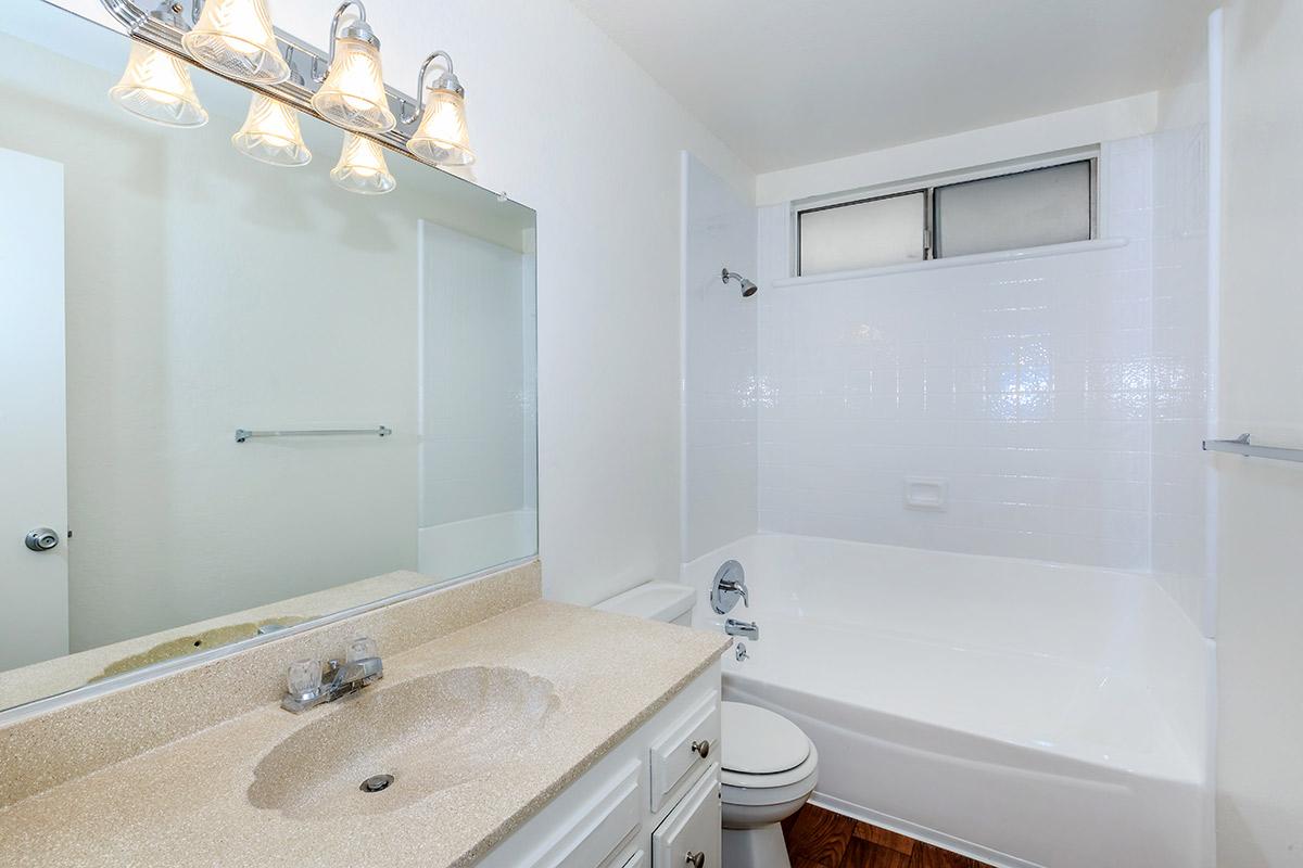 Bathroom with tan countertops