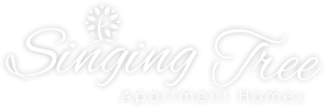 Singing Tree Apartment Homes Logo