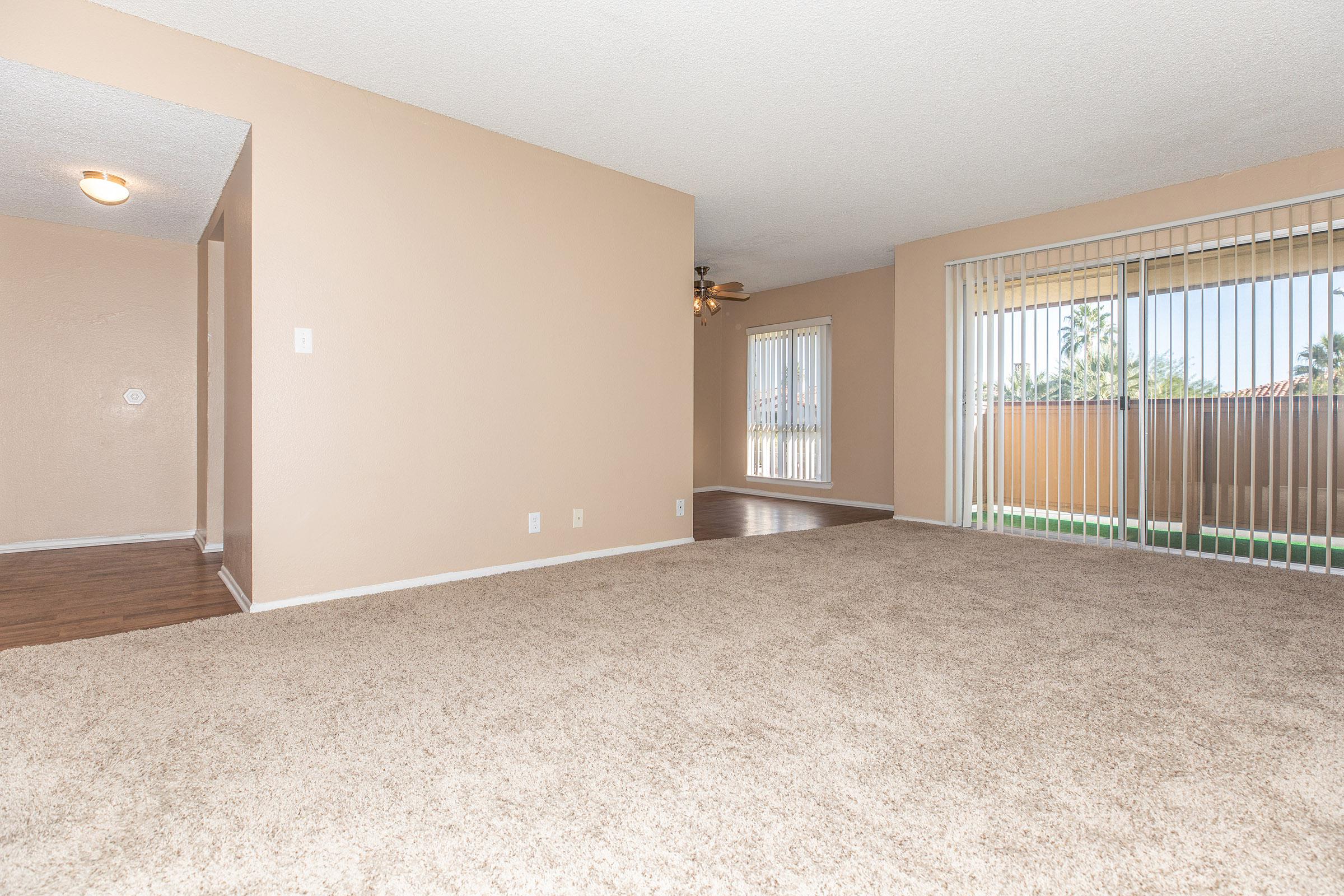 Vacant apartment with open window blinds