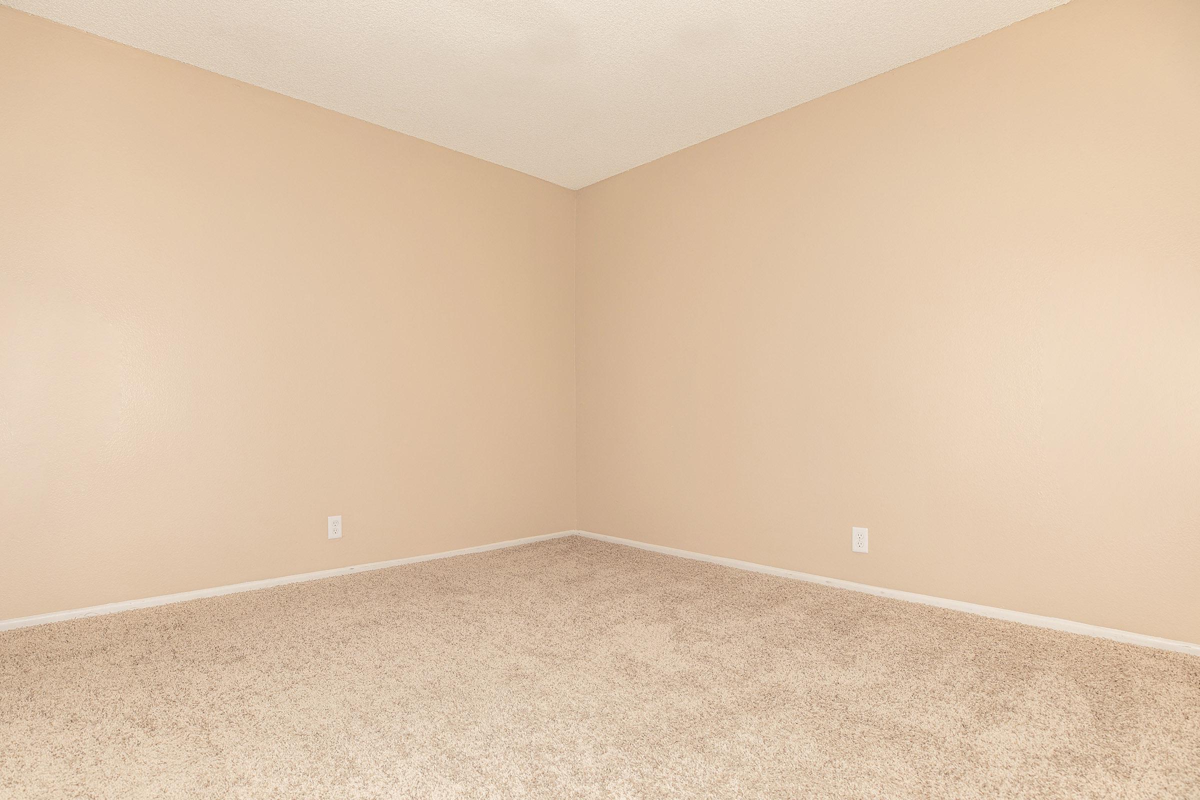 Unfurnished bedroom with carpeting