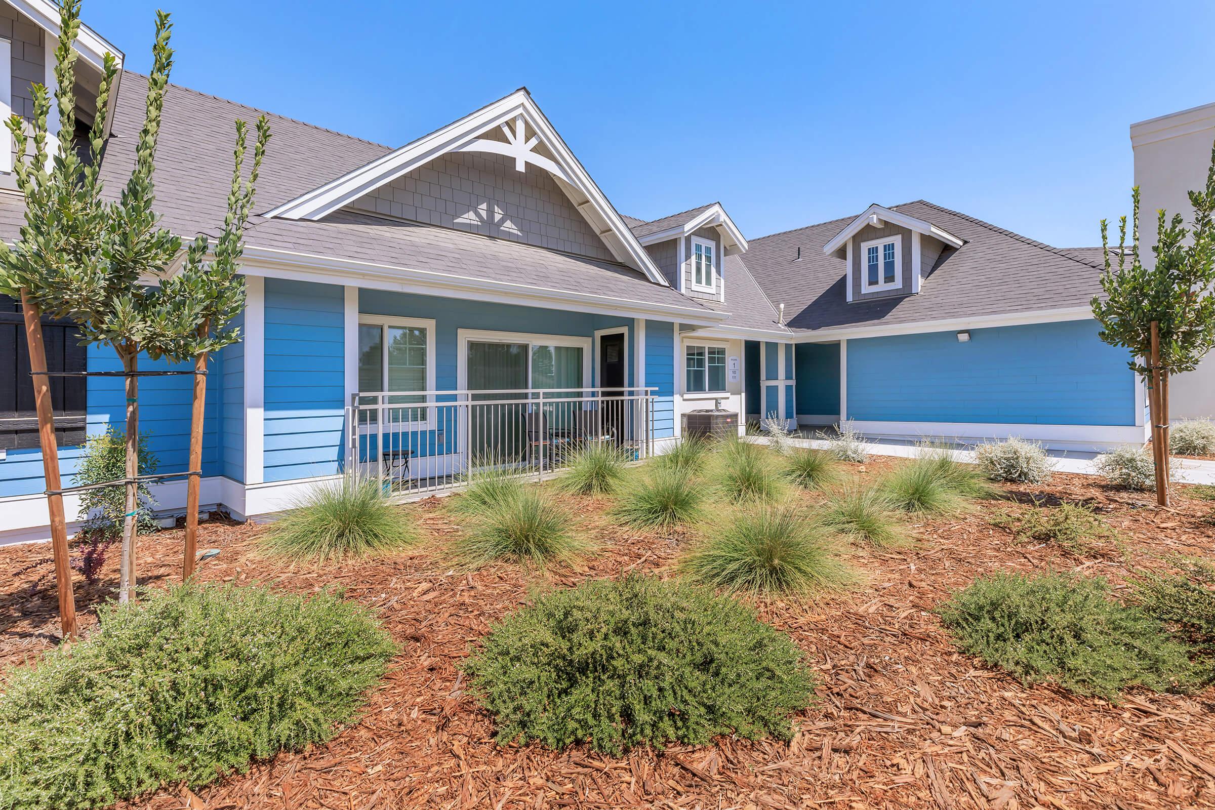 a house with trees in the background