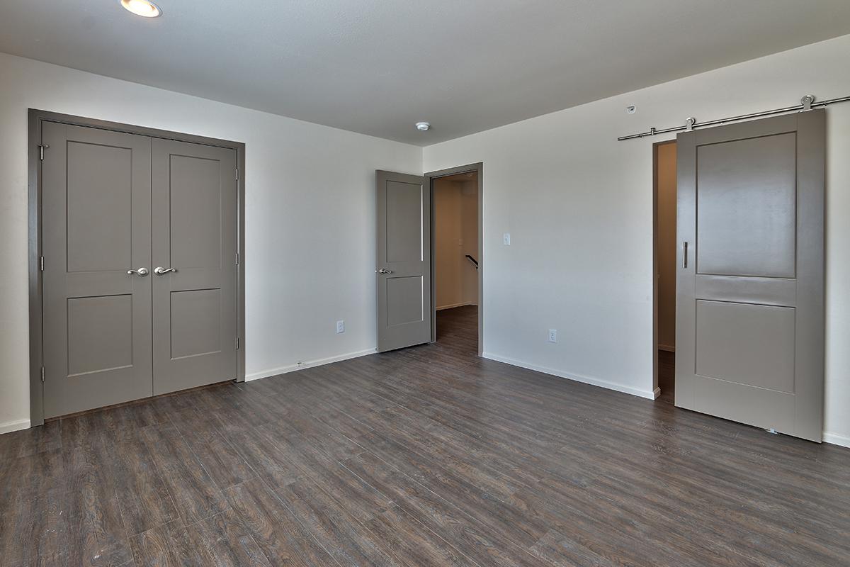 a kitchen with a wood floor