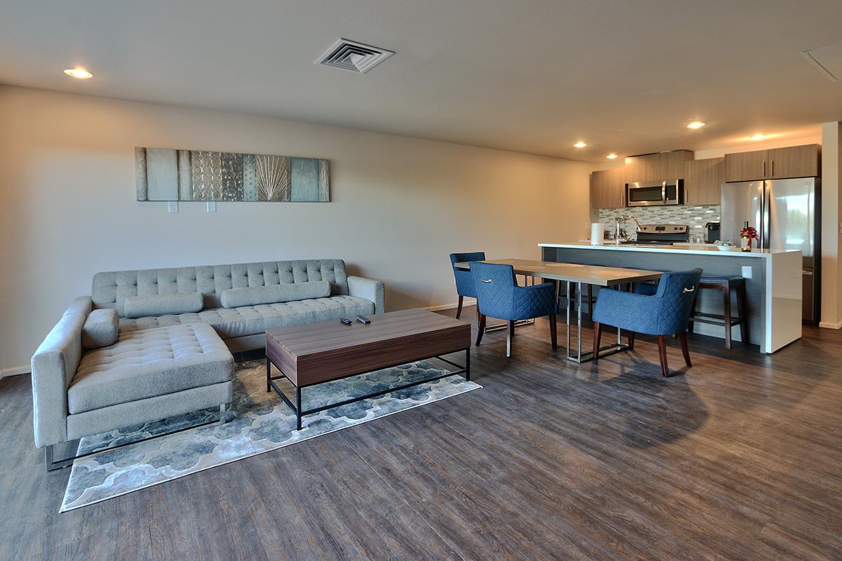 a living room with a wood floor