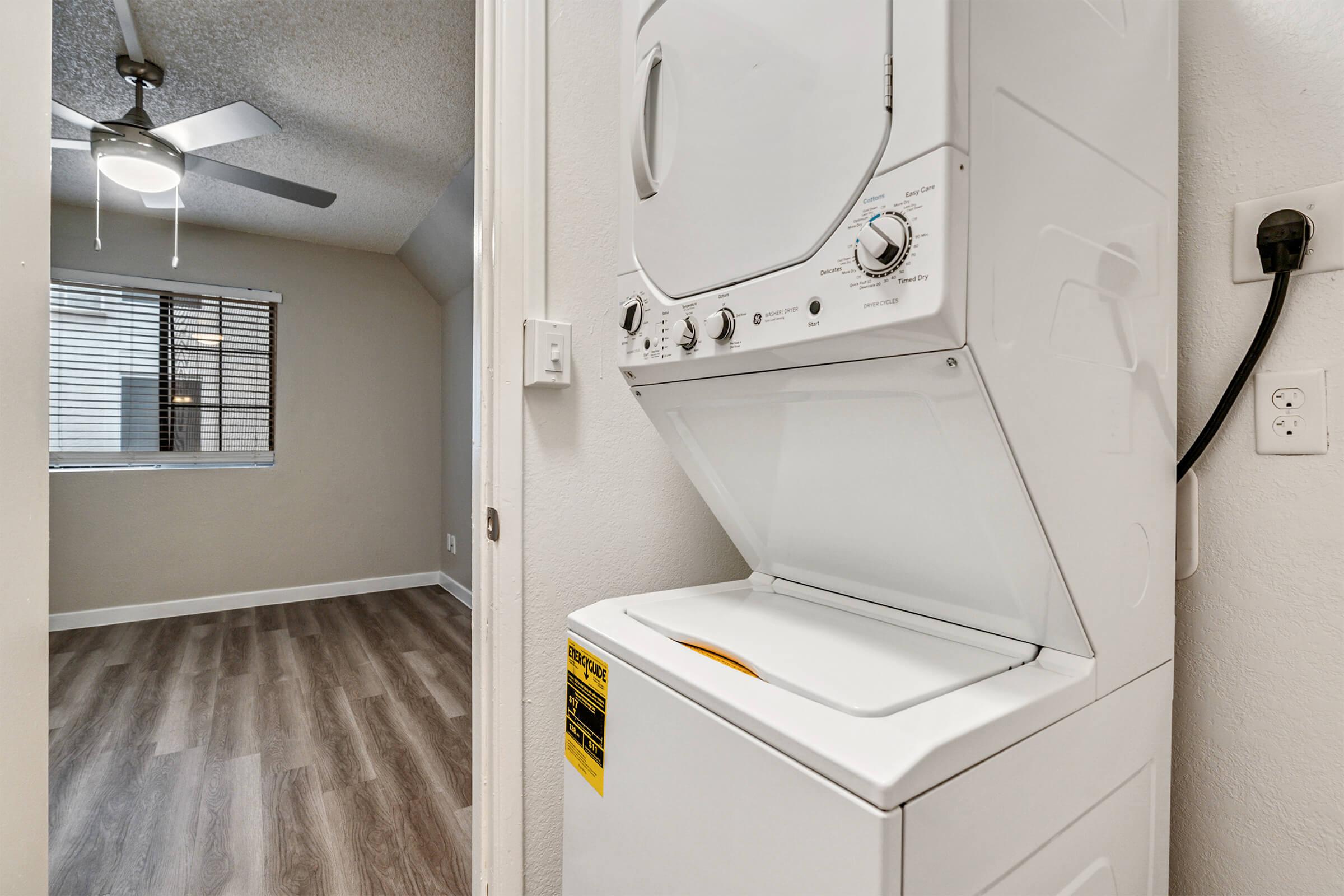 a room with a sink and a mirror