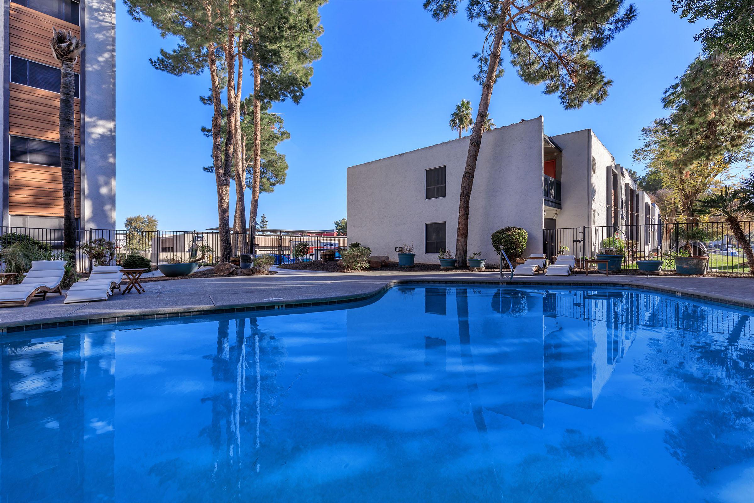 a large pool of water in front of a building