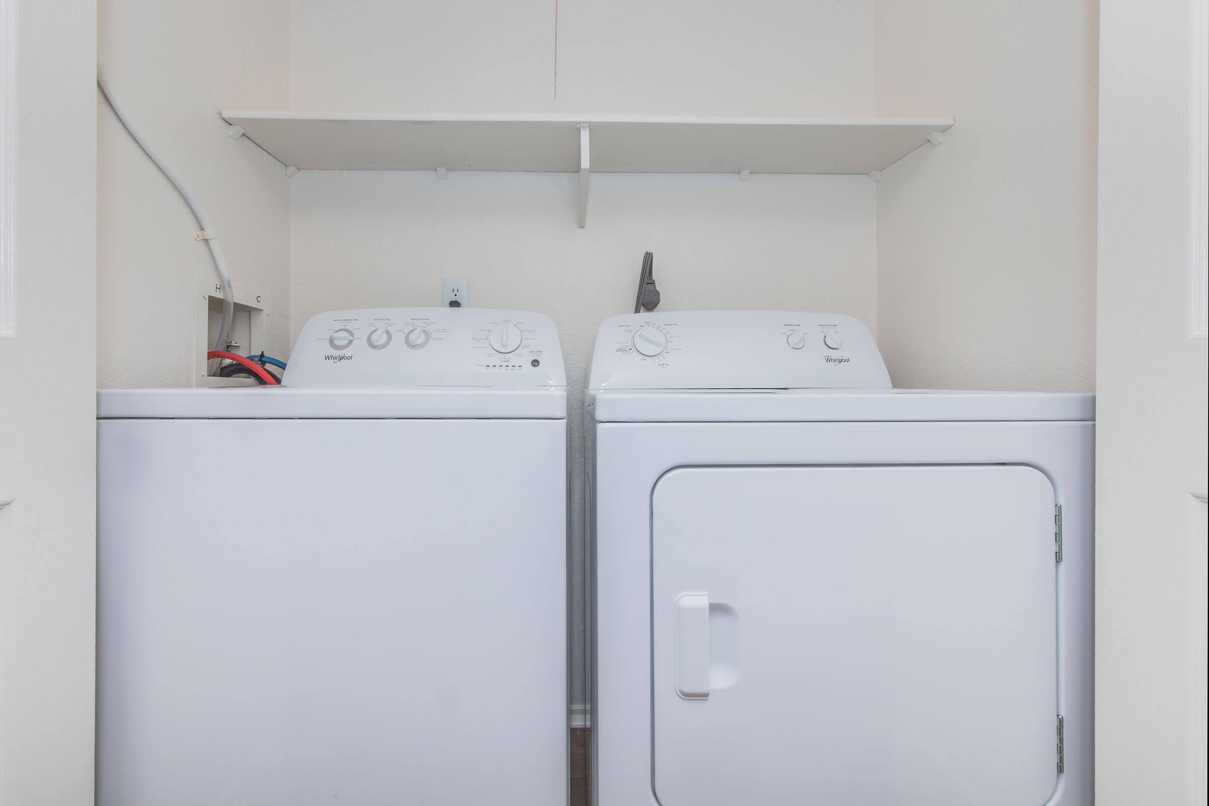 a stove top oven sitting inside of a refrigerator