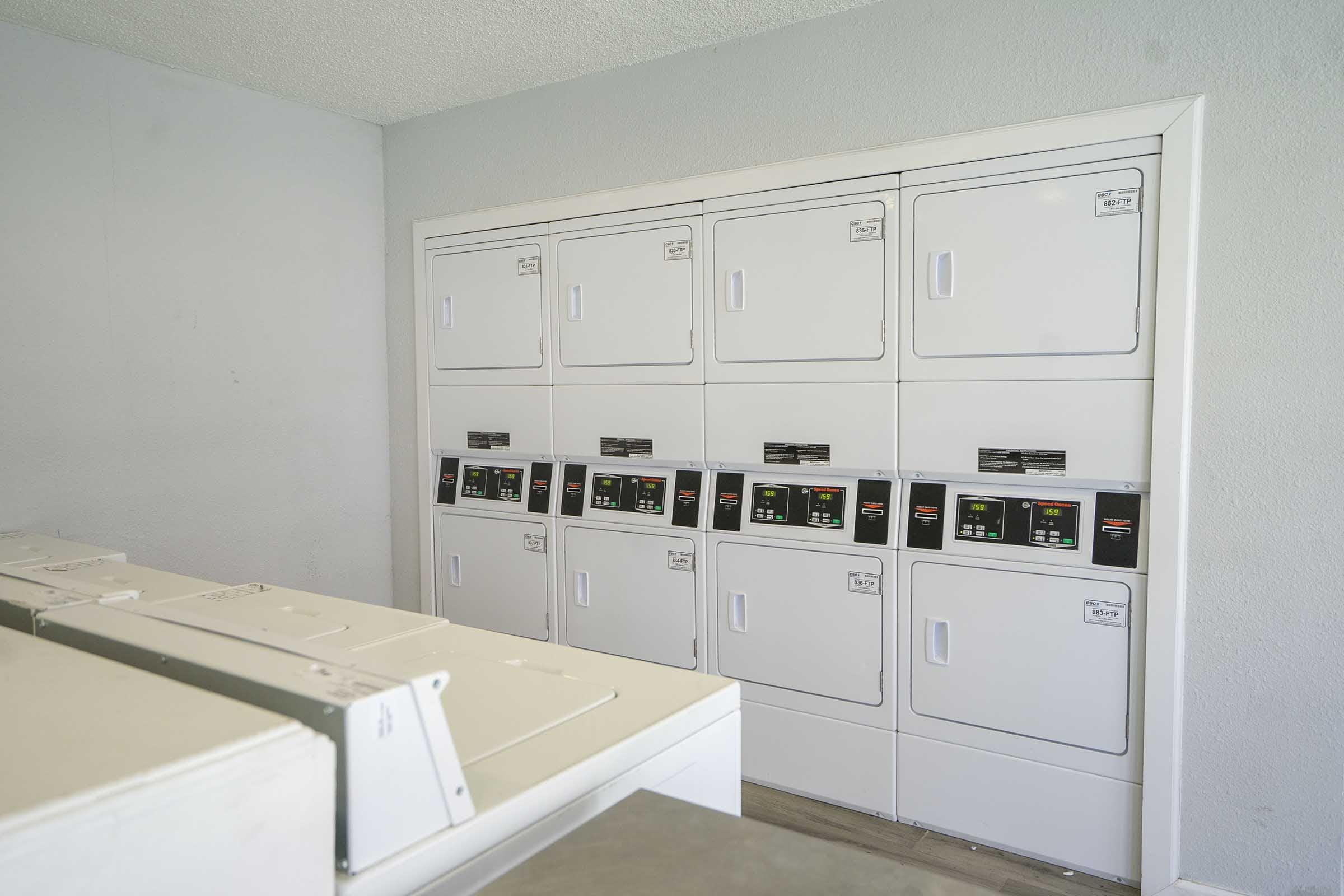 a kitchen with a stove and a refrigerator