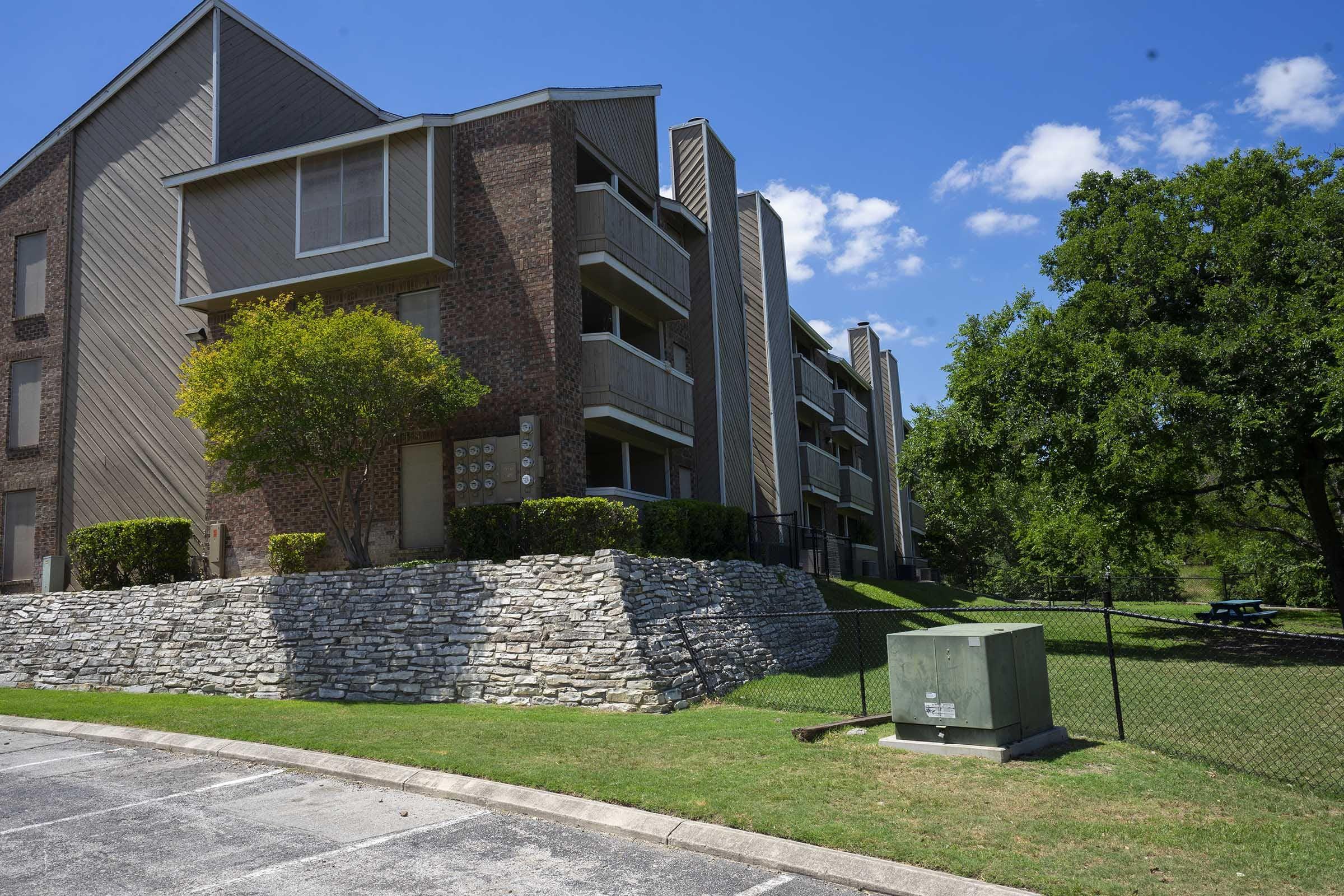 a large lawn in front of a building