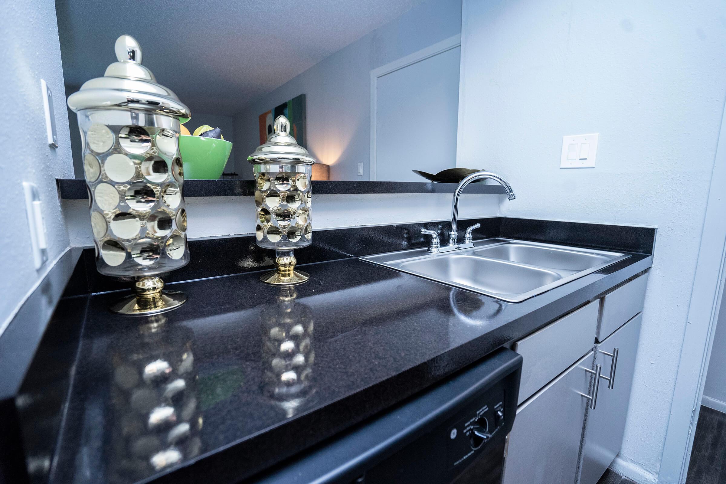 a stove top oven sitting inside of a kitchen counter