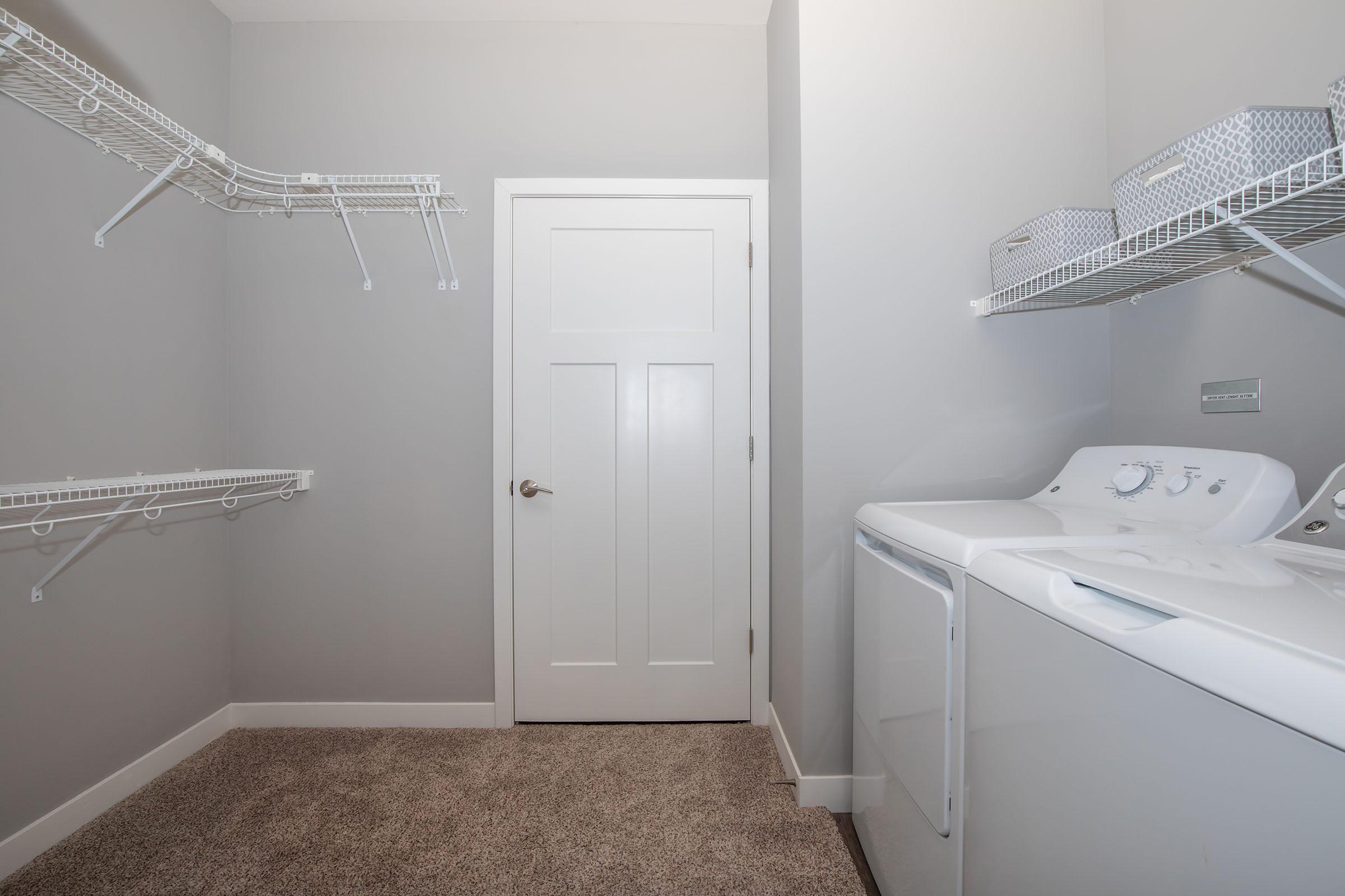 a bedroom with a large mirror