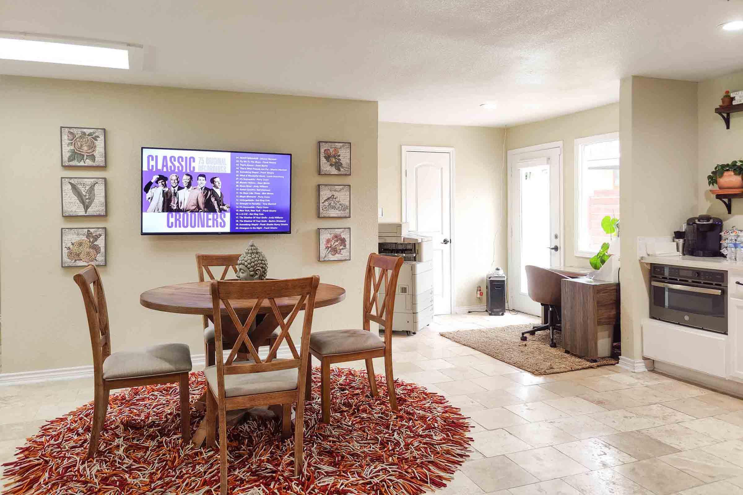 a living room filled with furniture and a fire place