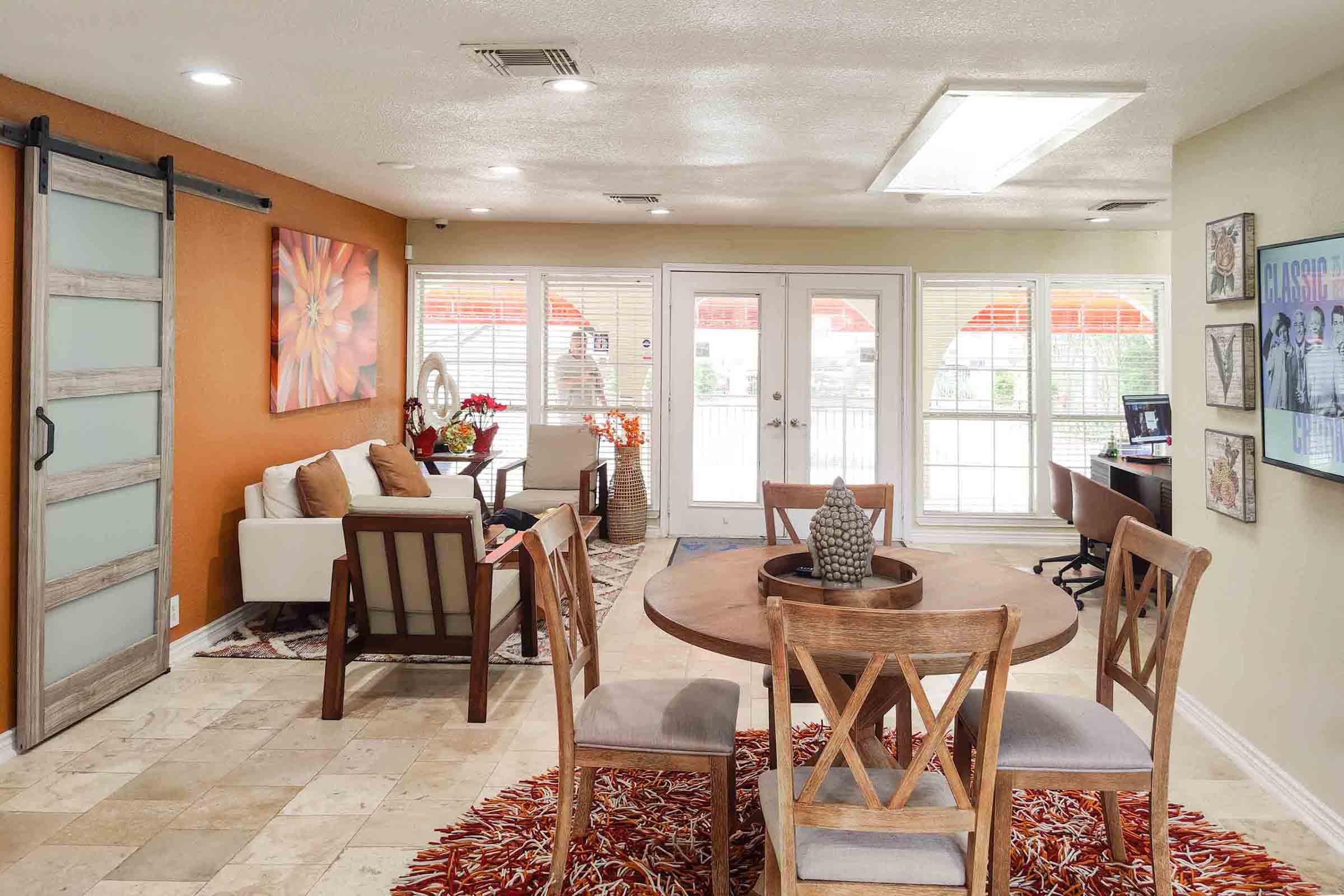 a living room filled with furniture and a fire place