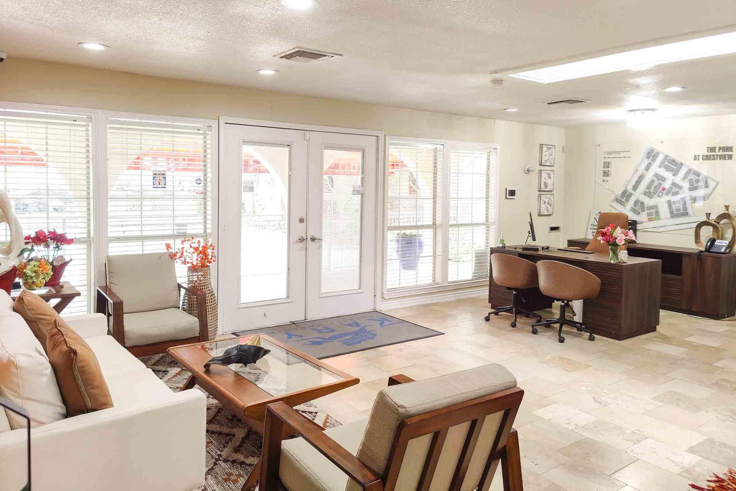 a living room filled with furniture and a fire place