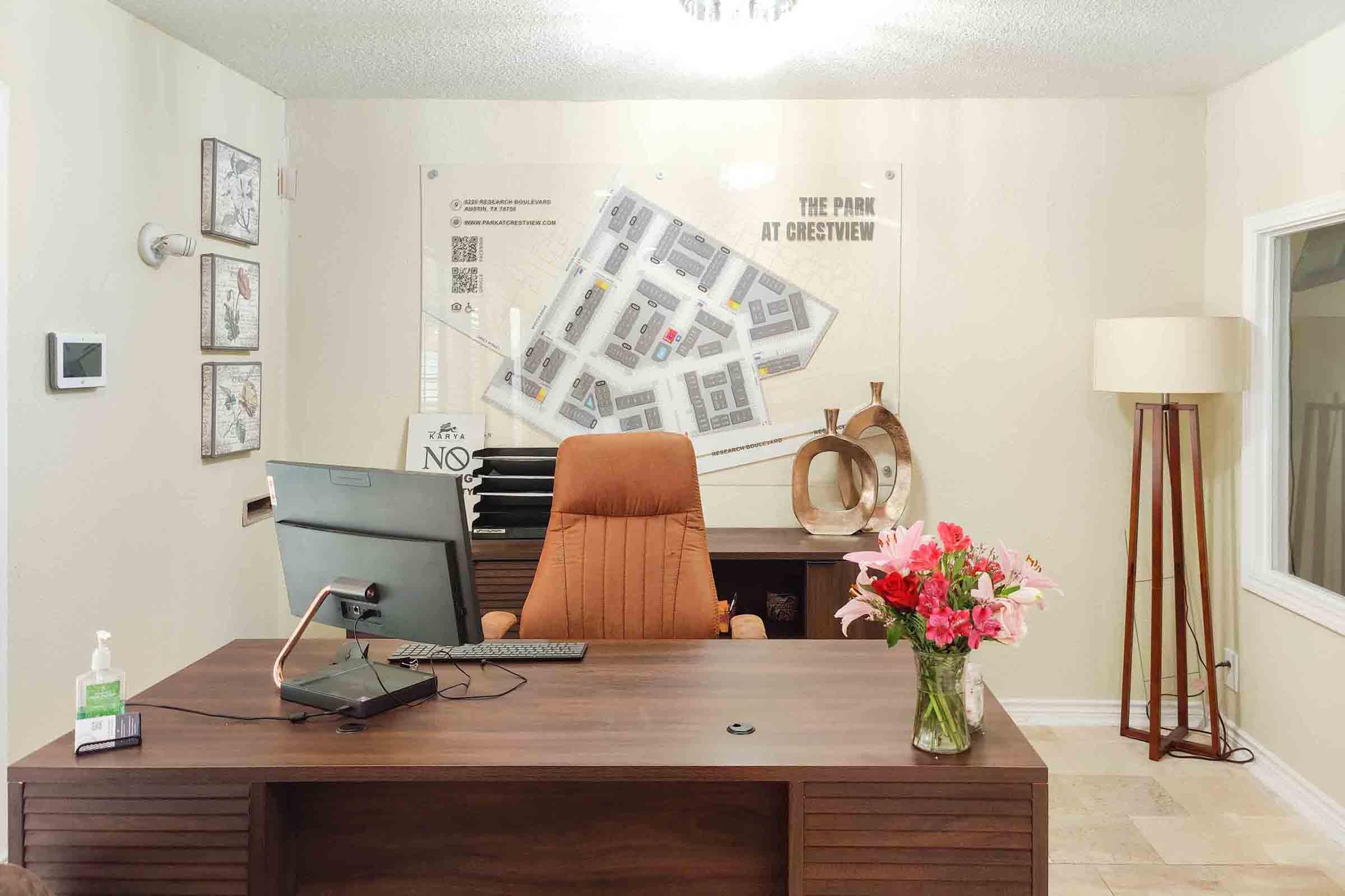 a living room filled with furniture and a lamp