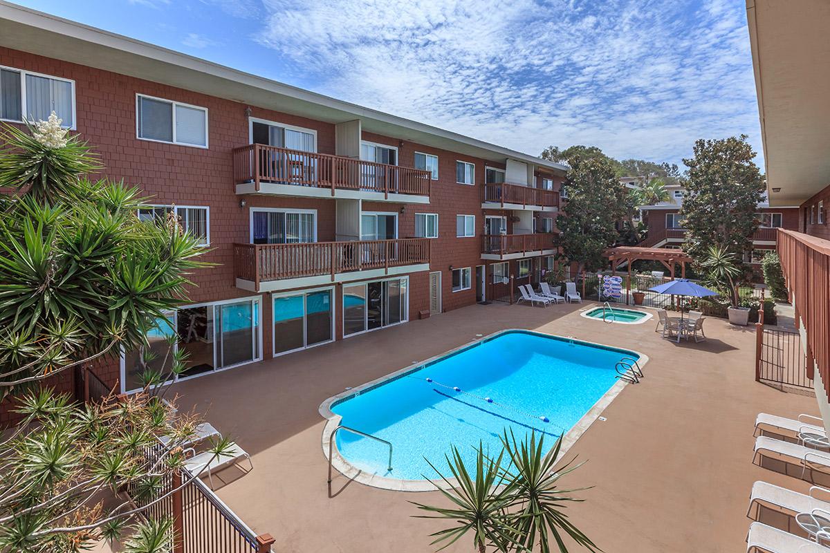 a pool next to a building